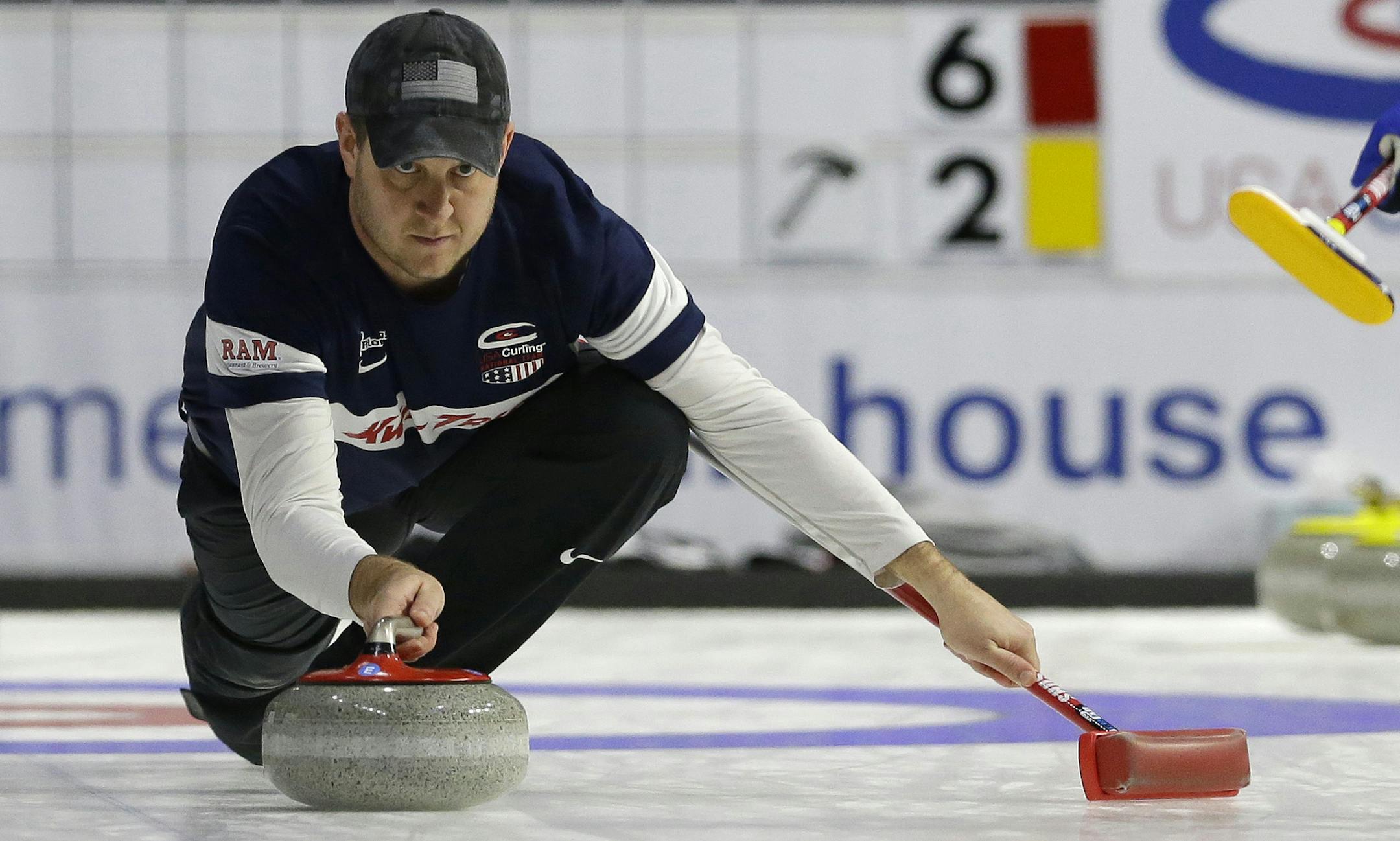 John Shuster, skip of Team Shuster, throws a rock Wednesday, Feb. 15, 2017, during a round-robin game of the U.S. curling nationals in Everett, Wash. (AP Photo/Ted S. Warren)