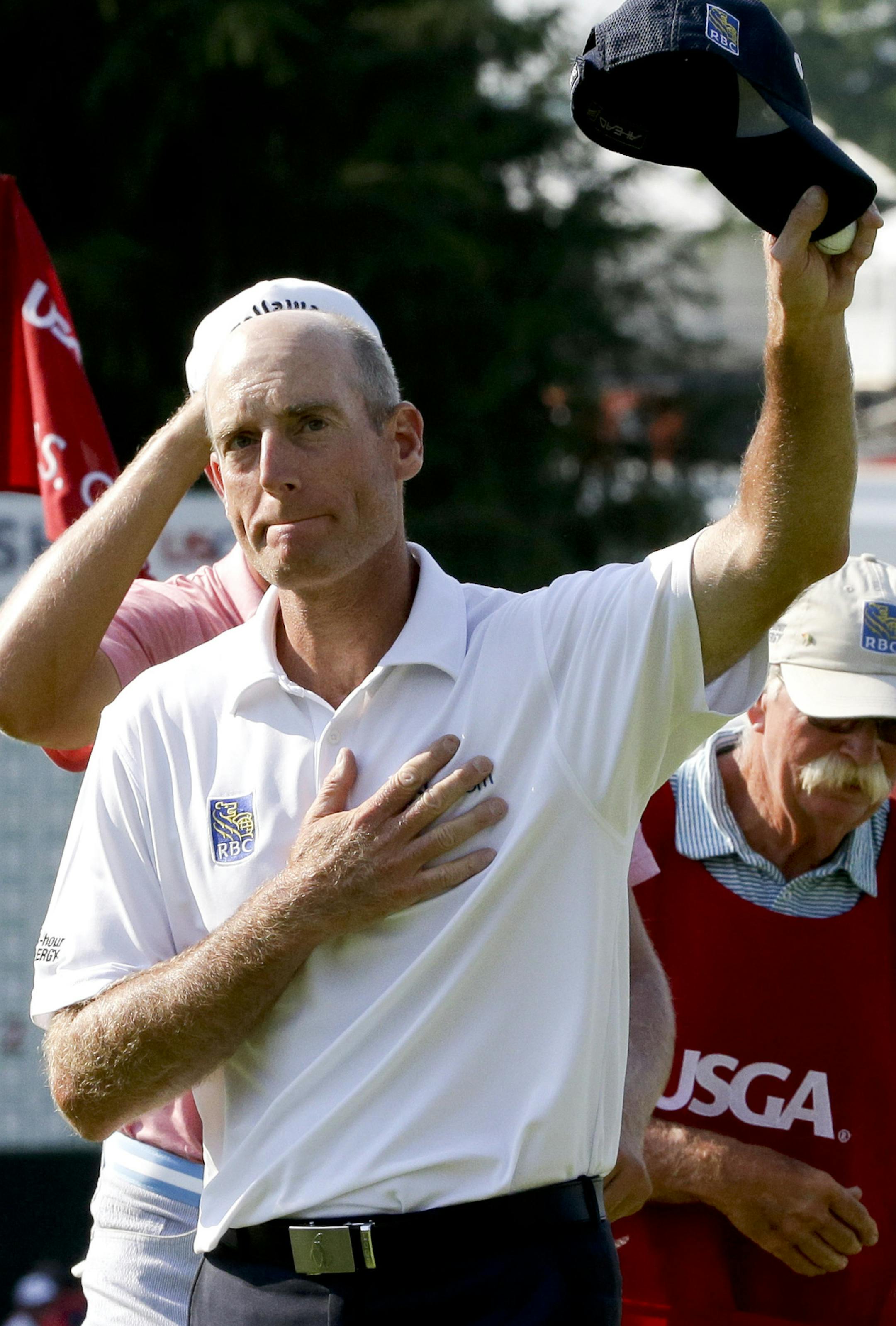 Jim Furyk waves to the crowd after finishing the final round of the U.S. Open golf championship at Oakmont Country Club on Sunday, June 19, 2016, in Oakmont, Pa. (AP Photo/Gene J. Puskar)