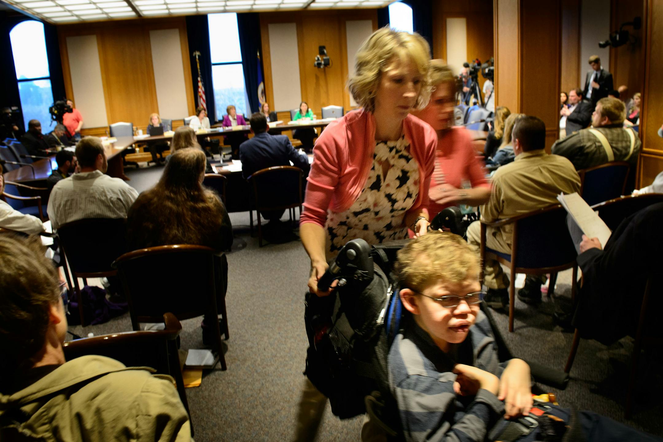 Kathy Engstrom of Rogers thought it was important for legislators to see the faces of the people who could benefit from medical marijuana. She took her son Nolan, 16, for a break during an April 25, 2014, hearing. Nolan has epilepsy and suffers from daily seizures.
