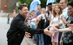 Hundreds of Minnesota "American Idol" fans cheered as host Ryan Seacrest arrived for for auditions at Mariucci Arena in Minneapolis in June 2014.