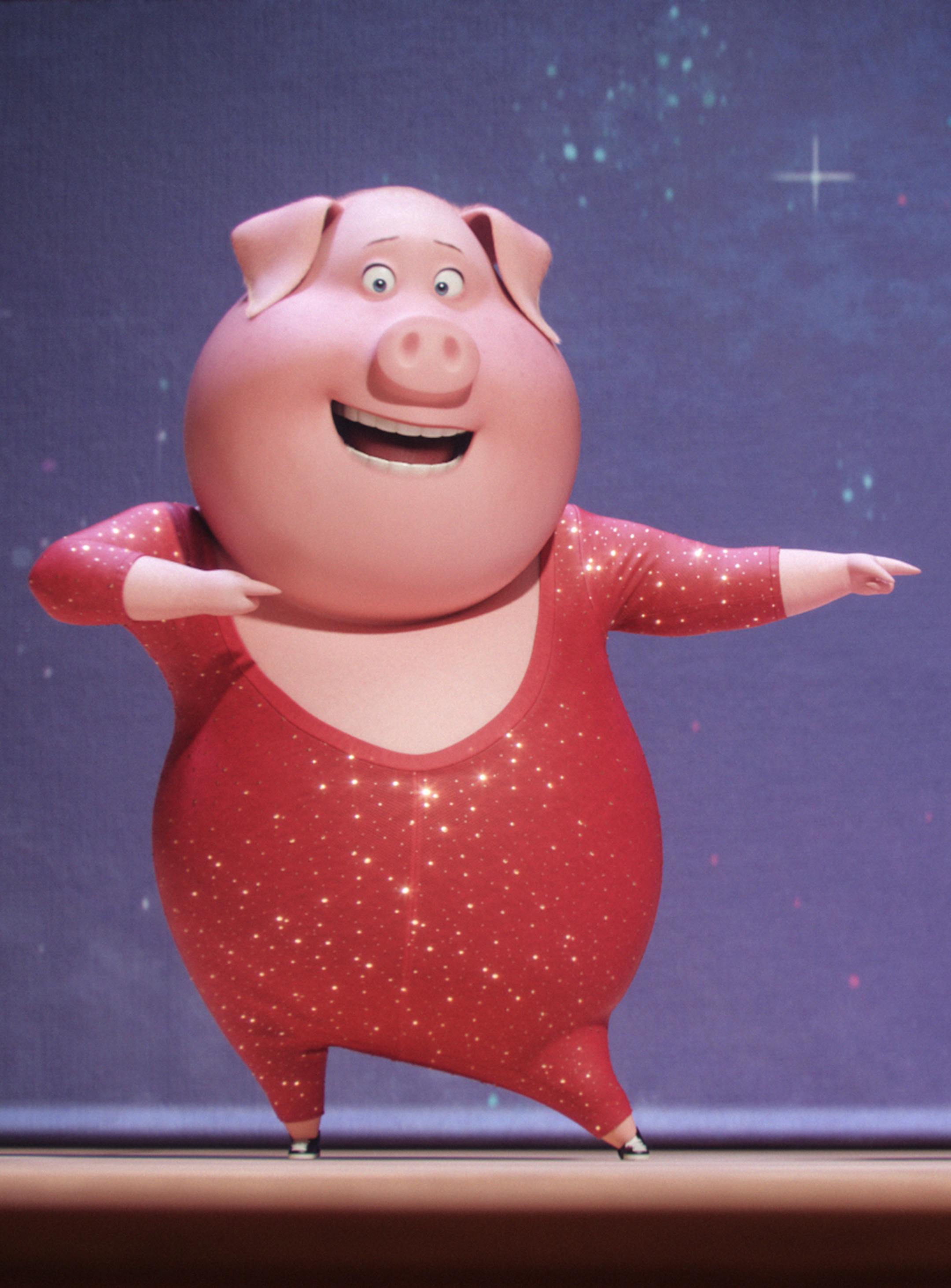 This image released by Universal Pictures shows Gunter, voiced by Nick Kroll, left, and Rosita, voiced by Reese Witherspoon, in a scene from, "Sing." (Illumination Entertainment/Universal Pictures via AP)