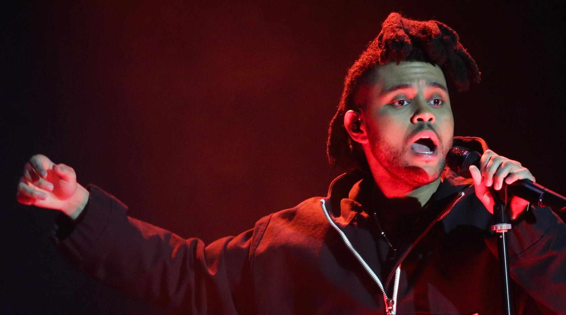 FILE - In this April 7, 2016, file photo, The Weeknd performs during the 2016 Echo Music Award ceremony in Berlin. Kanye West and The Weeknd will headline the first edition of the Meadows Music and Arts Festival in October 2016 in New York City. (AP Photo/Markus Schreiber, Pool, File) ORG XMIT: MIN2016071814212762