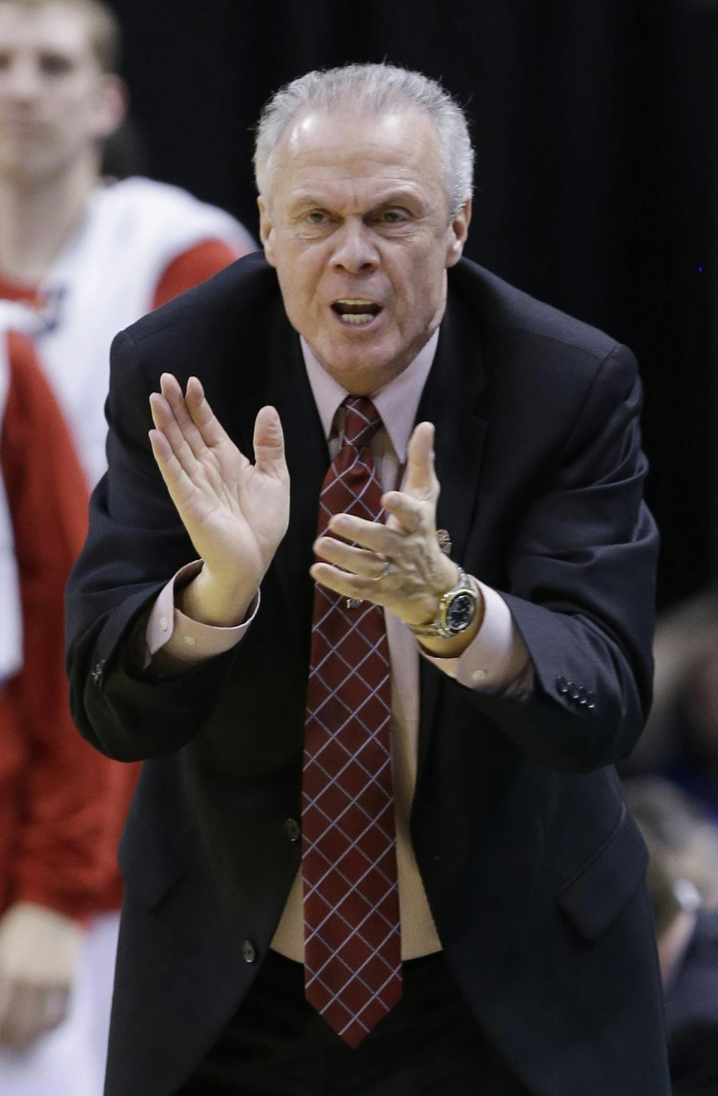 Wisconsin head coach Bo Ryan directs his team in the second half of an NCAA college basketball game against Minnesota in the quarterfinals of the Big Ten Conference tournament Friday, March 14, 2014, in Indianapolis. Wisconsin won 83-57. (AP Photo/Michael Conroy) ORG XMIT: NAF159