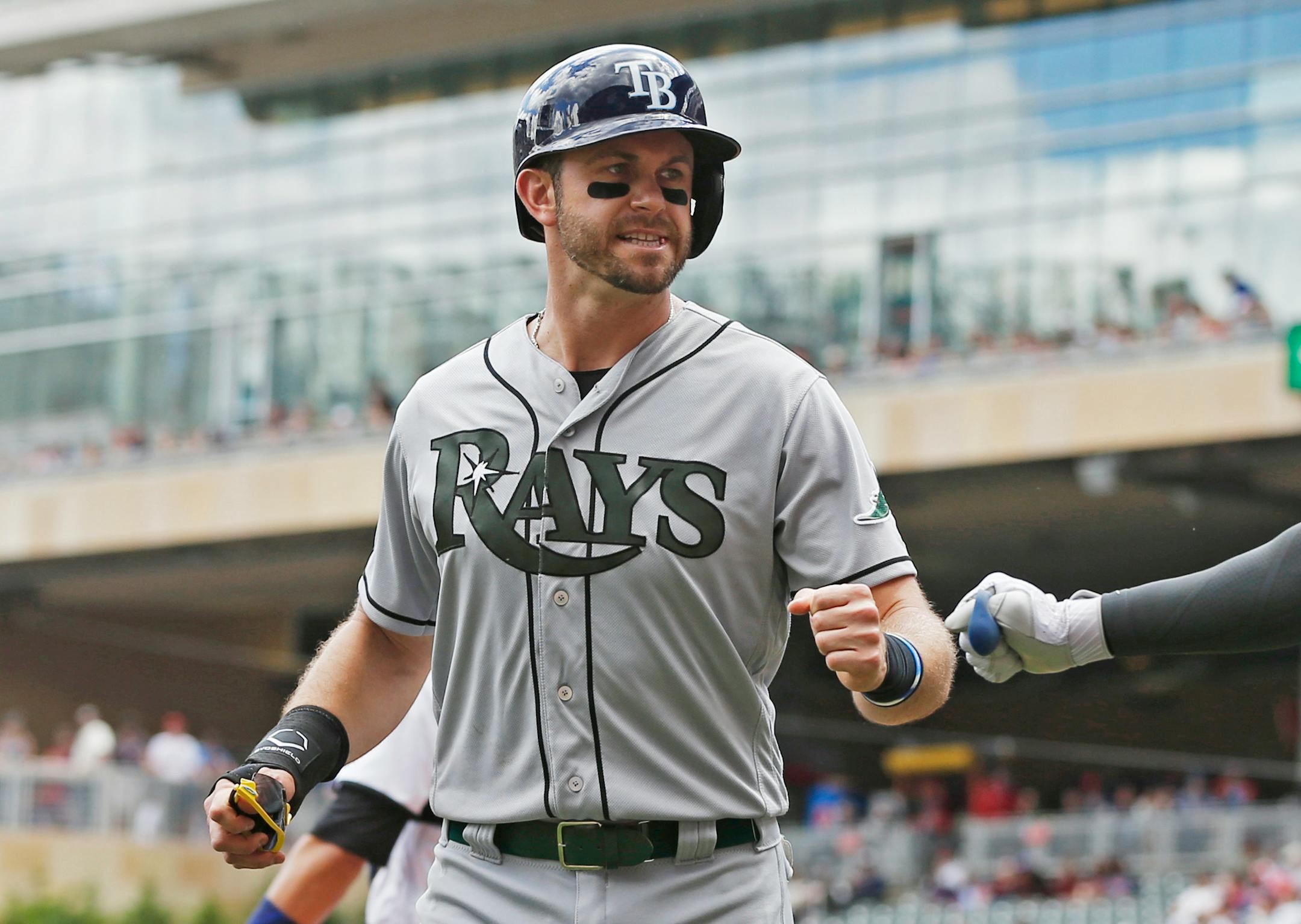 Tampa Bay Rays ' Evan Longoria scores on an RBI-single by Colby Rasmus off Minnesota Twins pitcher Kyle Gibson in the first inning of a baseball game Sunday, May 28, 2017, in Minneapolis. (AP Photo/Jim Mone)