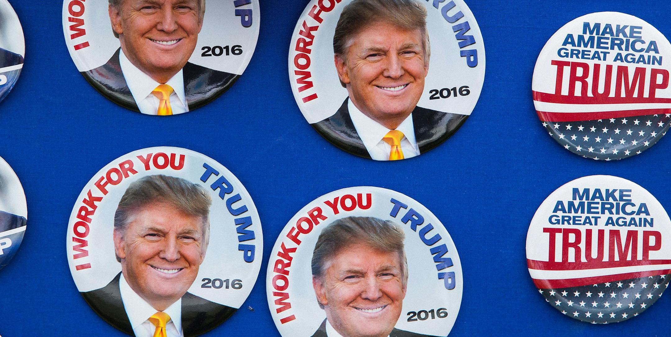 Donald trump buttons and masks for sale before the Republican presidential hopeful speaks at an event in Harrington, Del., April 22, 2016. (Damon Winter/The New York Times) -- PART OF A COLLECTION OF PHOTOS FROM THE 2016 CAMPAIGN TRAIL FOR USE AS DESIRED IN YEAREND STORIES AND RECAPS OF 2016 -- ORG XMIT: MIN2016101013461126