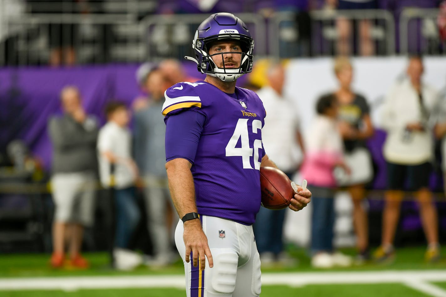 Minnesota Vikings long snapper Andrew DePaola warms up before their game against the San Francisco 49ers during an NFL preseason football game, Saturday, Aug. 20, 2022, in Minneapolis. (AP Photo/Craig Lassig)