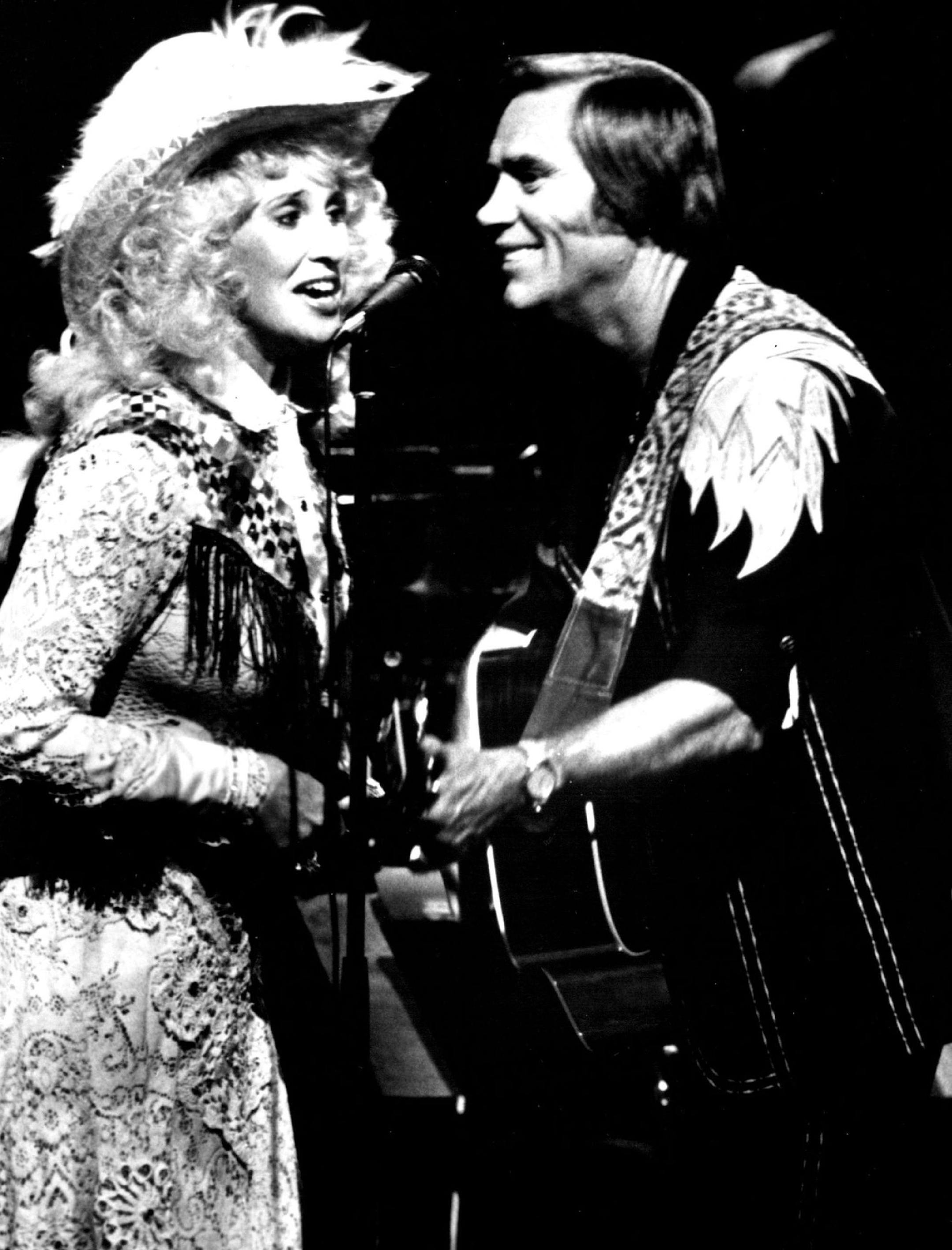 July 9, 1981 TOGETHER AGAIN: Nobody does it better than Tammy Wynette and George Jones when their talents are reunited in GEORGE JONES: WITH A LITTLE HELP FROM HIS FRIENDS, a rousing, foot-stomping evening of musical fun that also stars Jessi Colter, Elvis Costello, Emmylou Harris, Waylon Jennings, Georgette Jones and Tanya Tucker and debuts Saturday, July 11 at 8:00pm (EDT) on Home Box Office. HBO