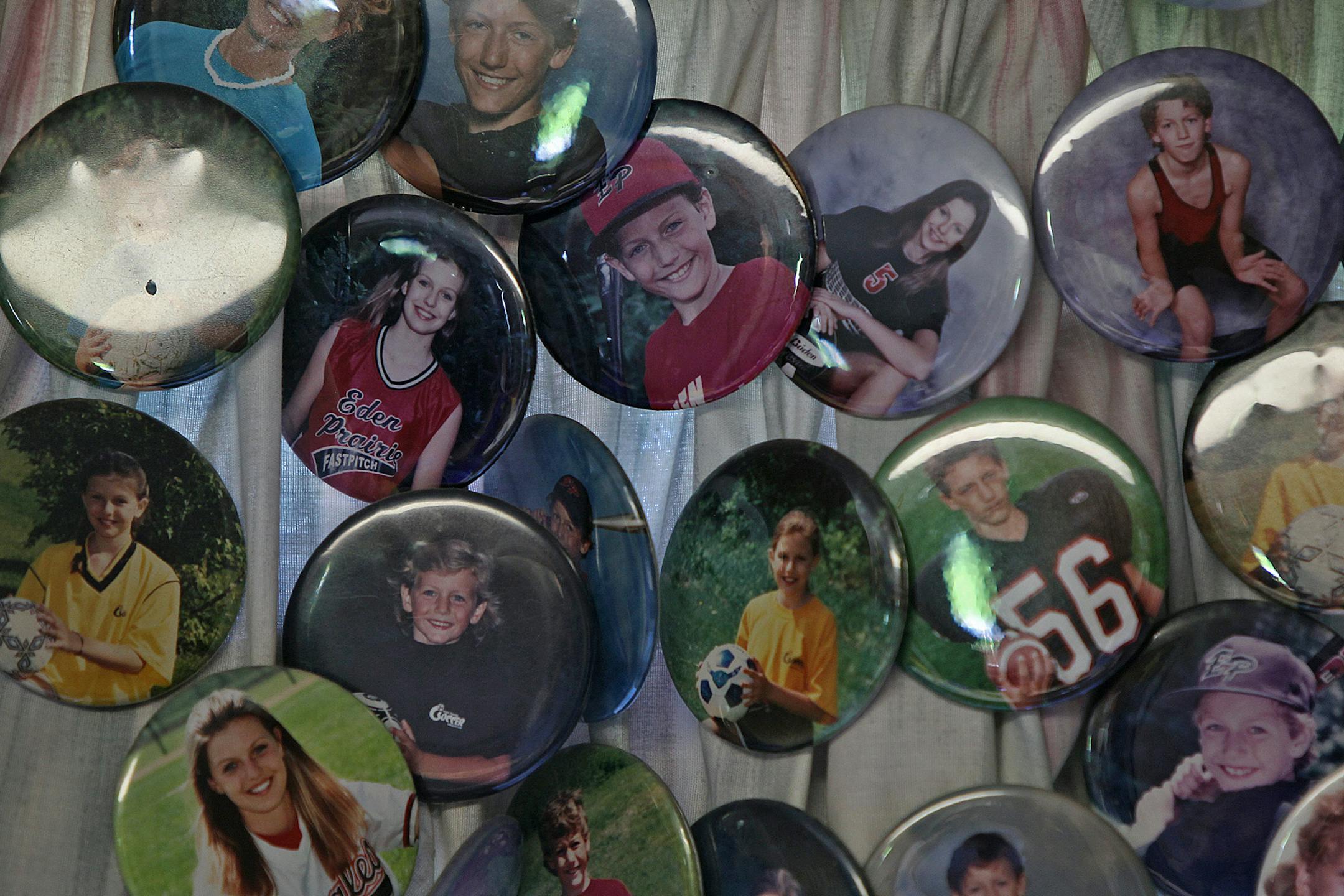 Photo buttons of Mandy Matula and her brother, Steven, are on display at the family home in Eden Prairie.