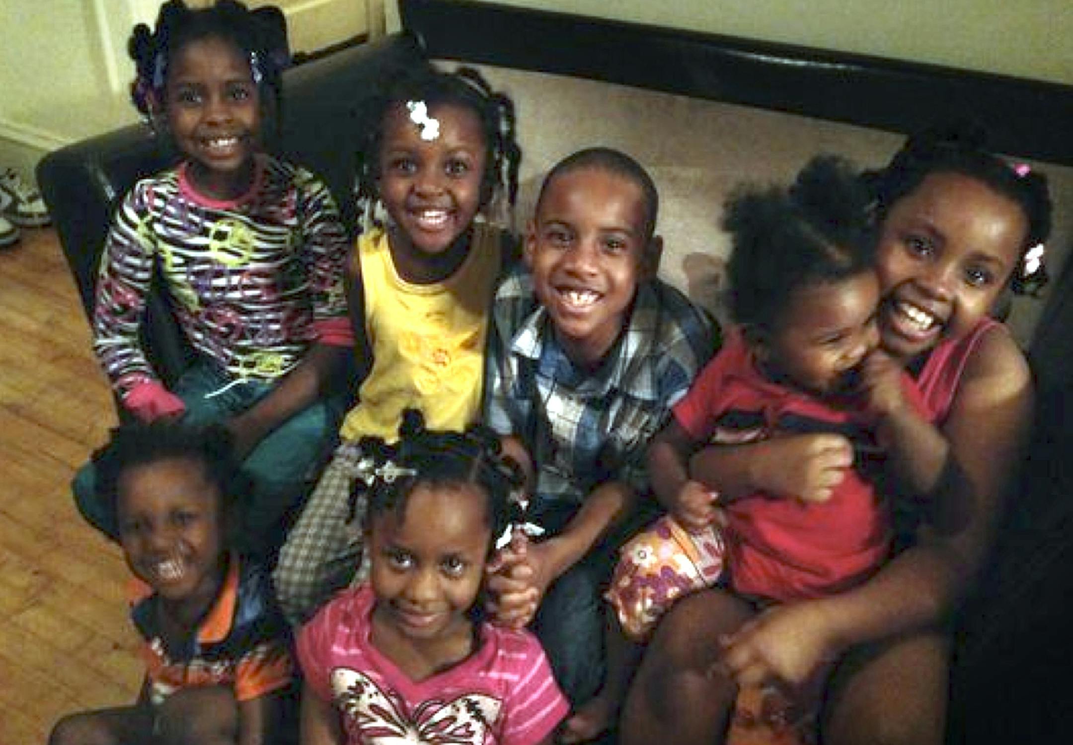 The Lewis family children. In front: Troy, left, and Electra. In back from left: Mary, Fannie, Christopher, Gwendolyn and Shaca. Only Electra and Shaca among the Lewis children survived the fire. CREDIT: Provided by the Lewis family