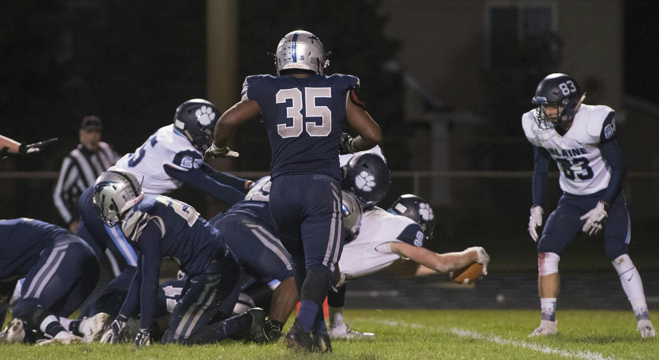 Blaine High School's Damari Porter reaches over the goal line to widen the Bengal's lead over the Champlin Park Rebels 30-14, Friday, Sept. 28, 2018. Blaine went on to win 30-14. ] (Matthew Hintz, 092818, Champlin)