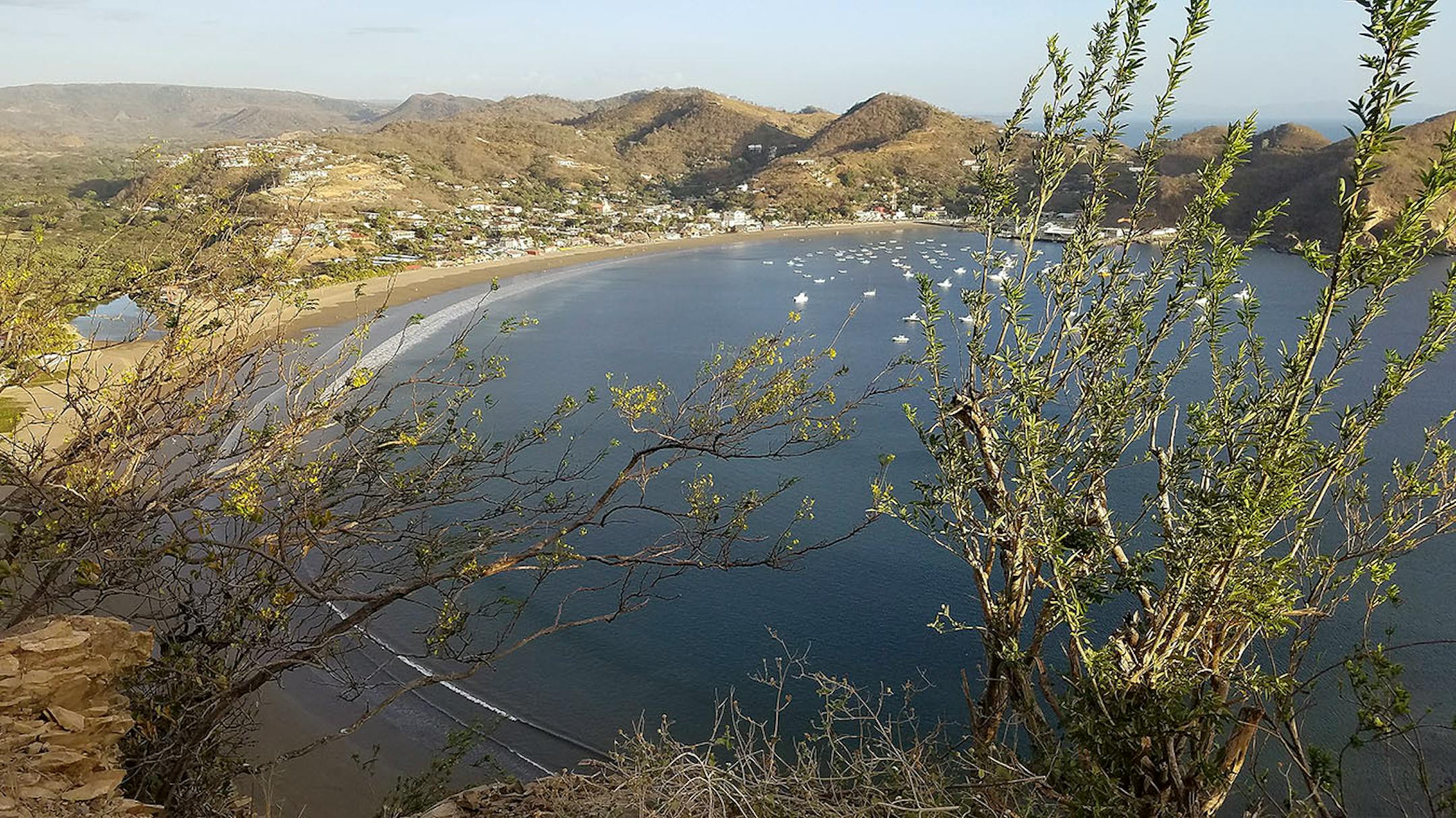 The tourism and surfing colony of San Juan del Sur, Nicaragua, and its bay are seen from the Cristo de la Misericordia (Christ of the Mercy) monument that overlooks the city.