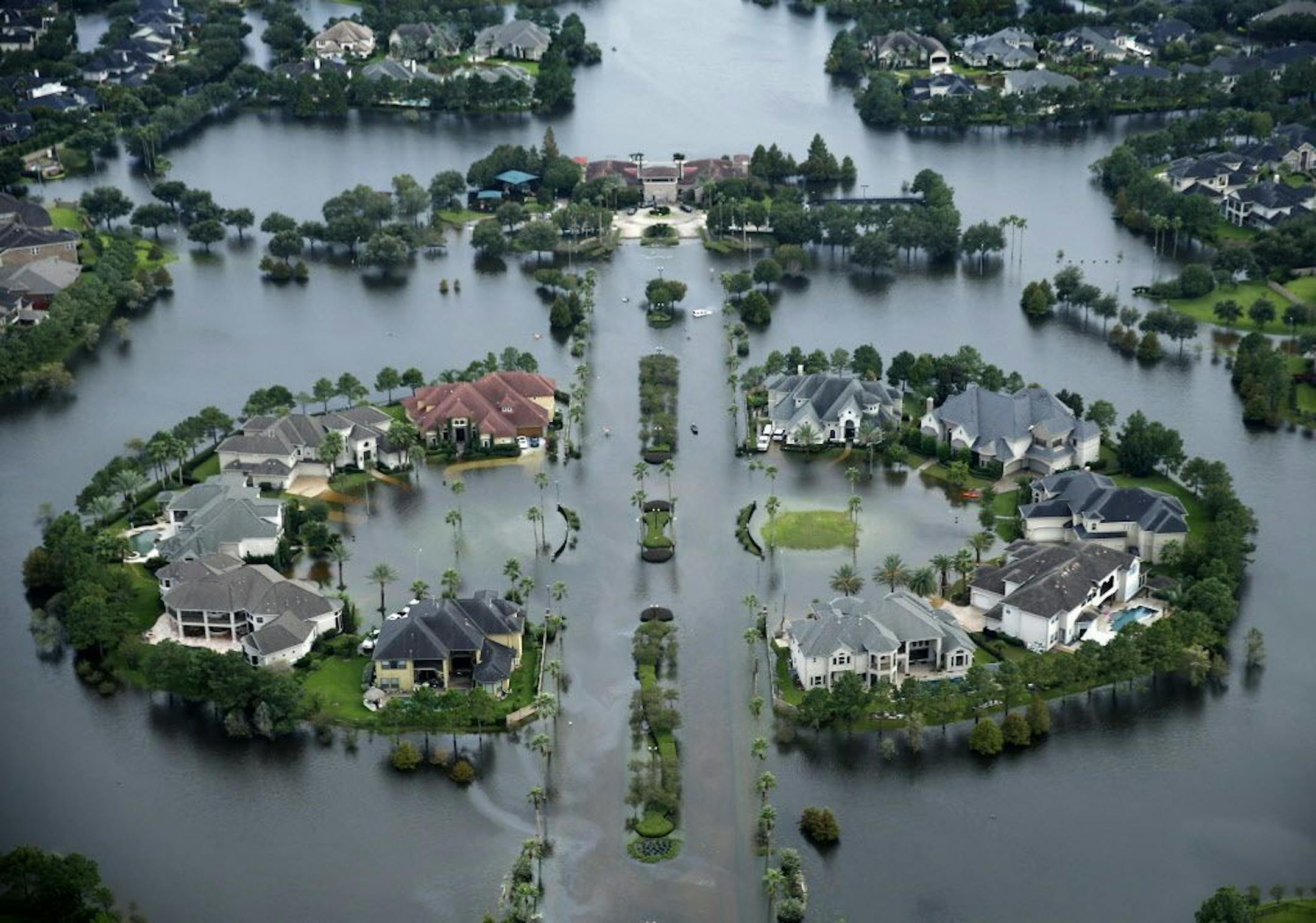 Flood waters have risen into the Lakes on Eldridge North neighborhood near the Addicks Reservoir West Houston, Texas on Wednesday, Aug. 30, 2017. Hurricane Harvey inundated the Houston area with several feet of rain. (Tom Fox/Dallas Morning News/TNS) NO MAGAZINE SALES MANDATORY CREDIT; NO SALES; INTERNET USE BY TNS CONTRIBUTORS ONLY