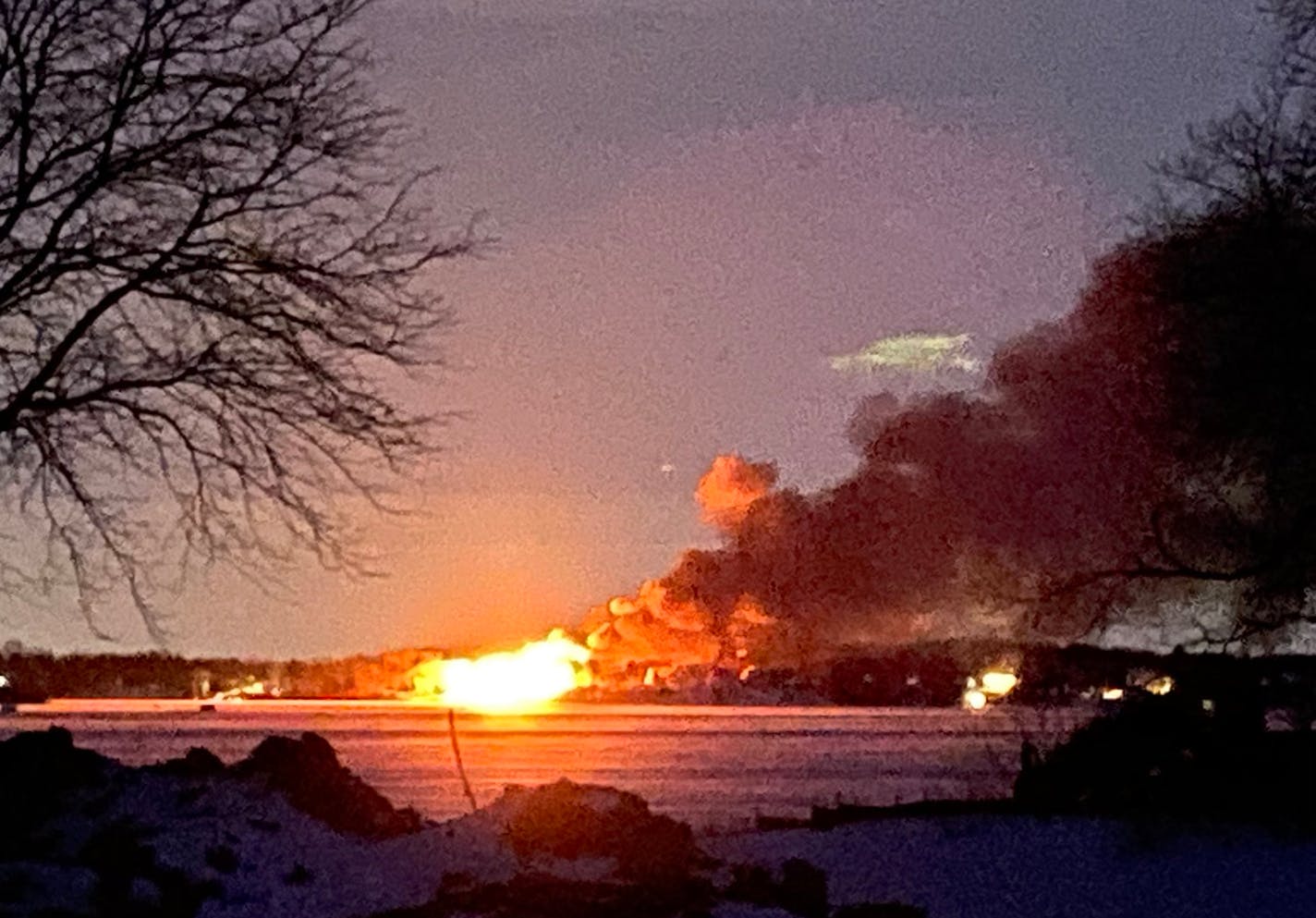 A large house fire on the shore of Lake Minnetonka produced flames visible across the lake along with smoke that was showing up on Twin Cities weather radar.