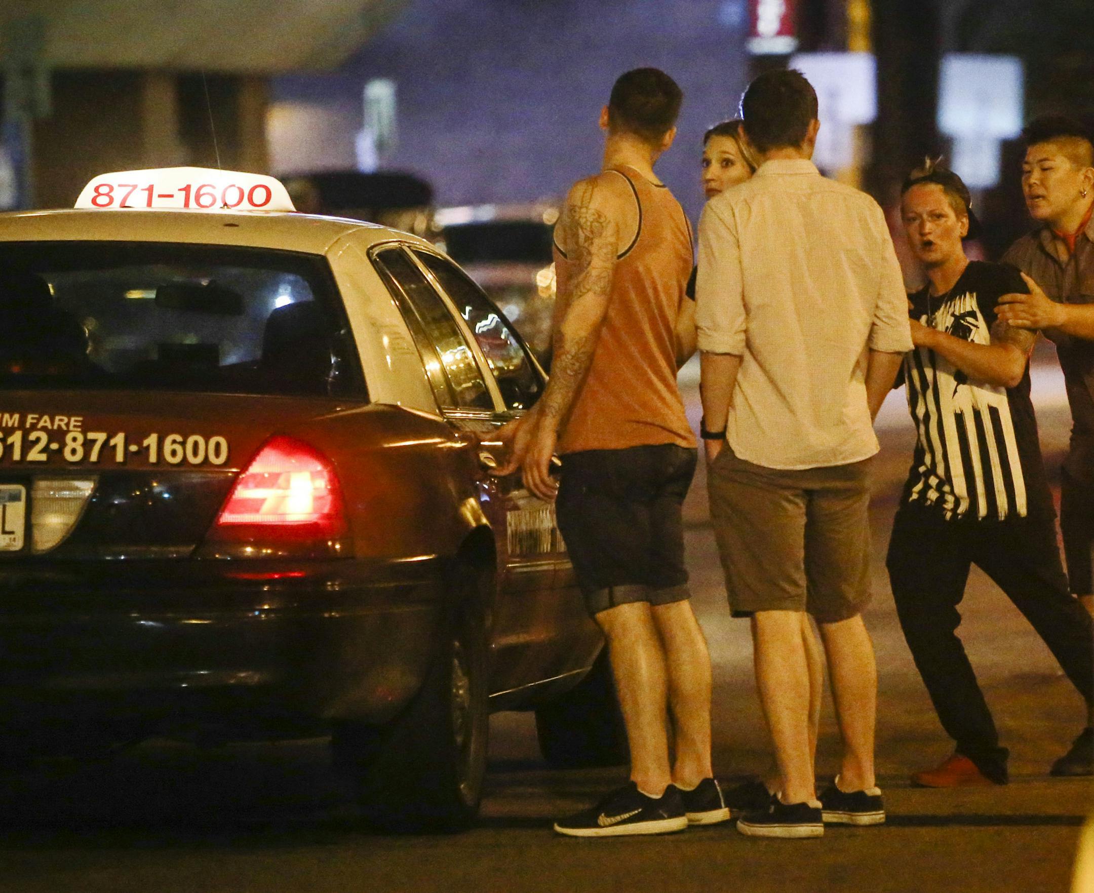 Competition for taxi service got contentious outside First Avenue as two groups vying for a taxi exchanged words Saturday, June 28, 2014, in downtown Minneapolis MN.] (DAVID JOLES/STARTRIBUNE) djoles@startribune Last January, Gabriel Keller told the city he saw a taxi driver "intentionally" running a red light, "followed by three stop signs without slowing down, all of which were next to a school. Another resident complained that he was trying to pay the driver with a credit card, but the driver