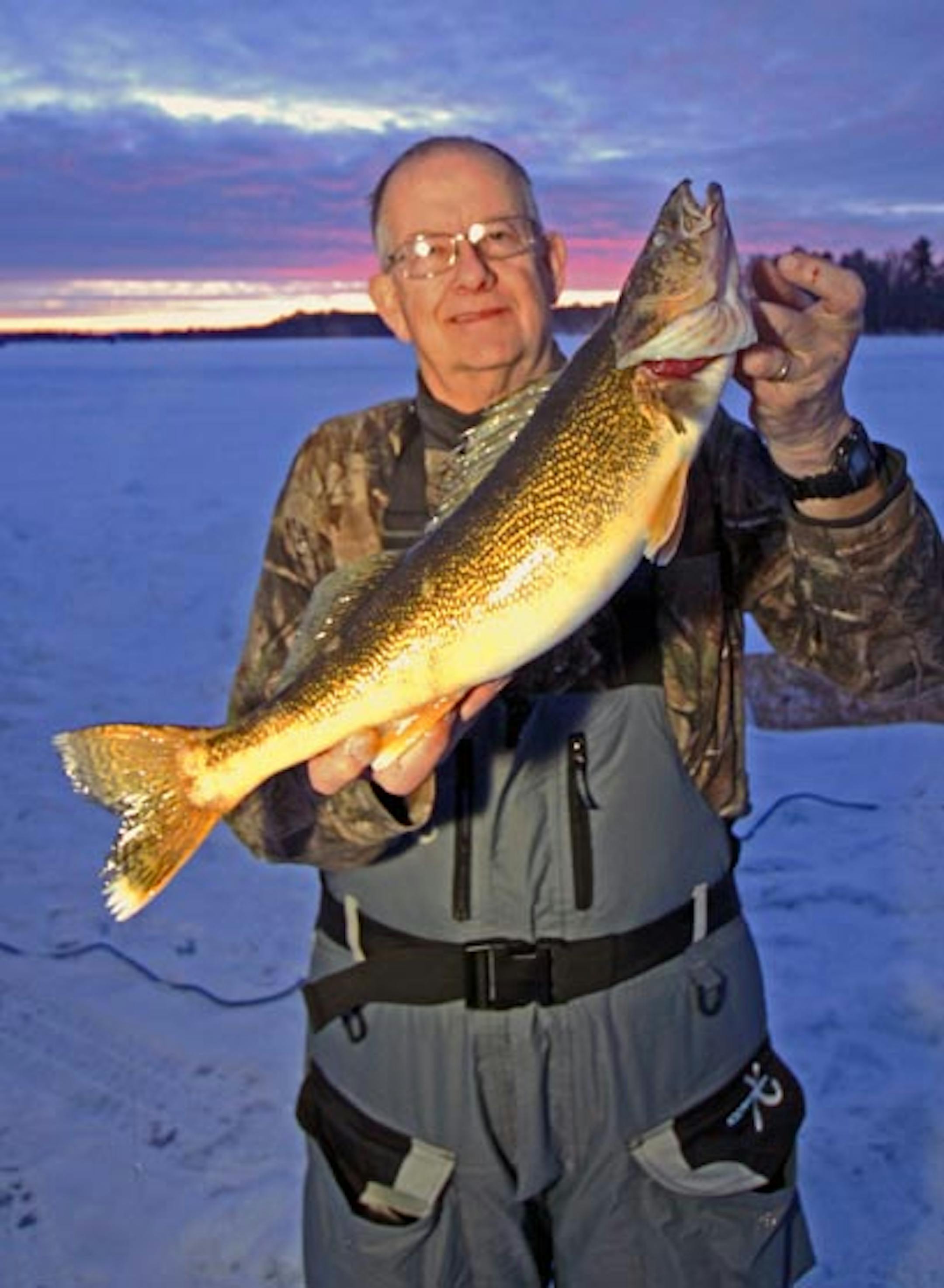 The author's father (Ron Hustvedt Sr.) with an early morning walleye that made it into the frying pan that night