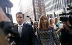 Patti Blagojevich, right, wife of former Illinois Gov. Rod Blagojevich arrives at the federal courthouse Tuesday, Aug. 9, 2016 in Chicago. A federal j