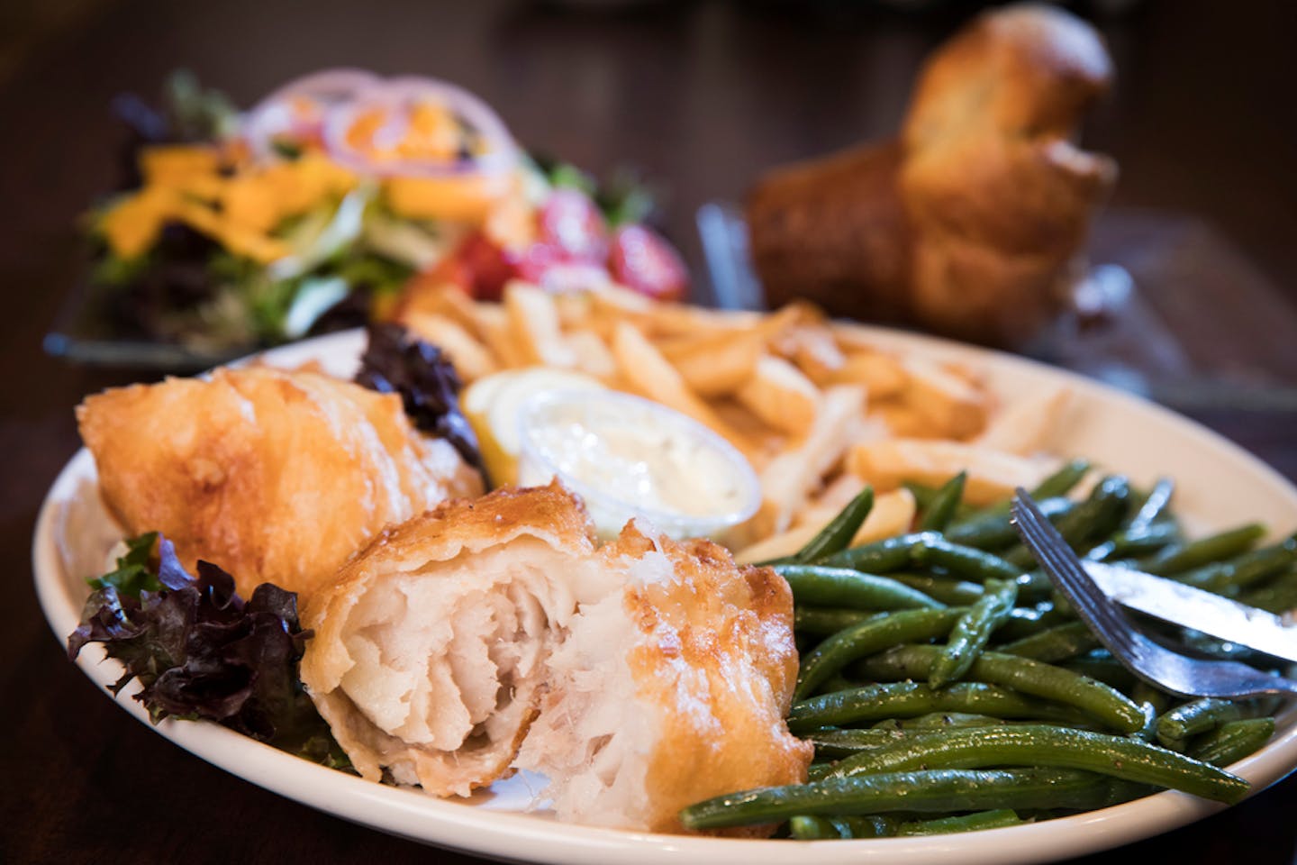 The Little Oven's fish fry dinner with green beans, french fries, salad and a popover. ] LEILA NAVIDI • leila.navidi@startribune.com BACKGROUND INFORMATION: The Little Oven's fish fry dinner photographed on Thursday, March 2, 2017.