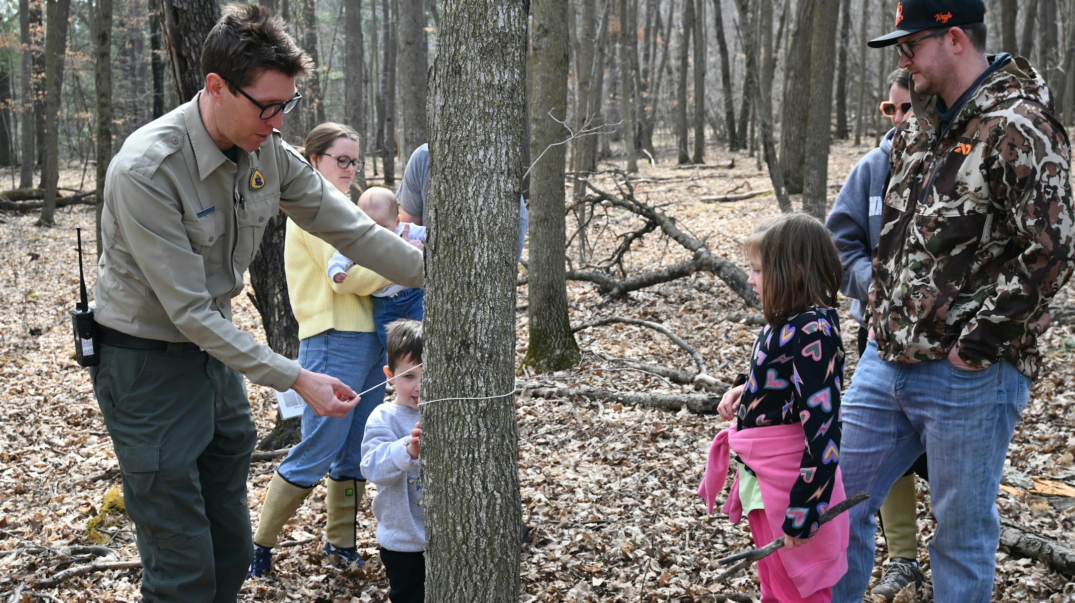 DNR Interpretive Naturalist Sean Hoppes leading a Maple Syrup program in Wild River State Park