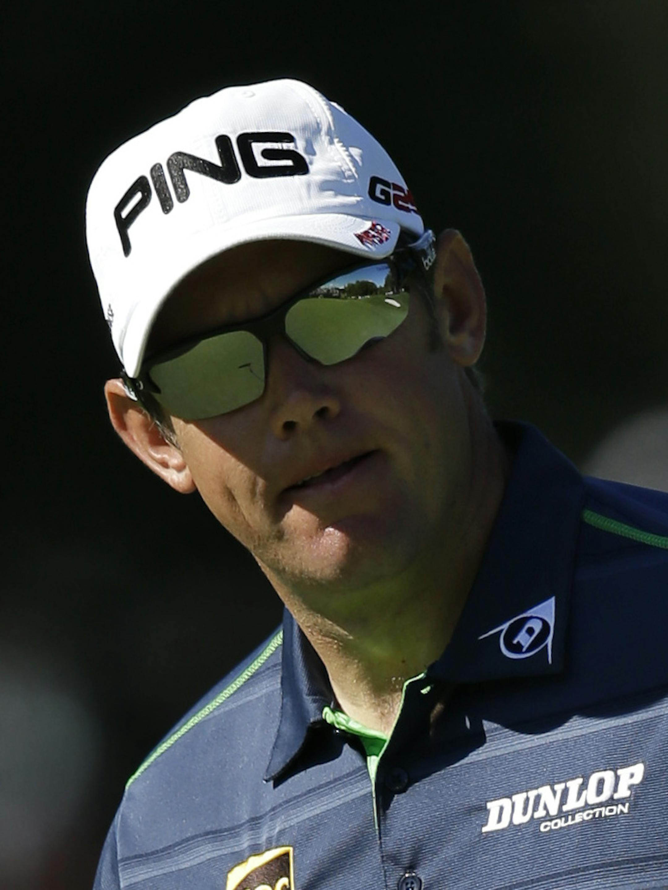 Lee Westwood, of England, reacts after missing a birdie putt on the 16th hole during the third round of the PGA Championship golf tournament at Oak Hill Country Club, Saturday, Aug. 10, 2013, in Pittsford, N.Y. (AP Photo/Charlie Neibergall)