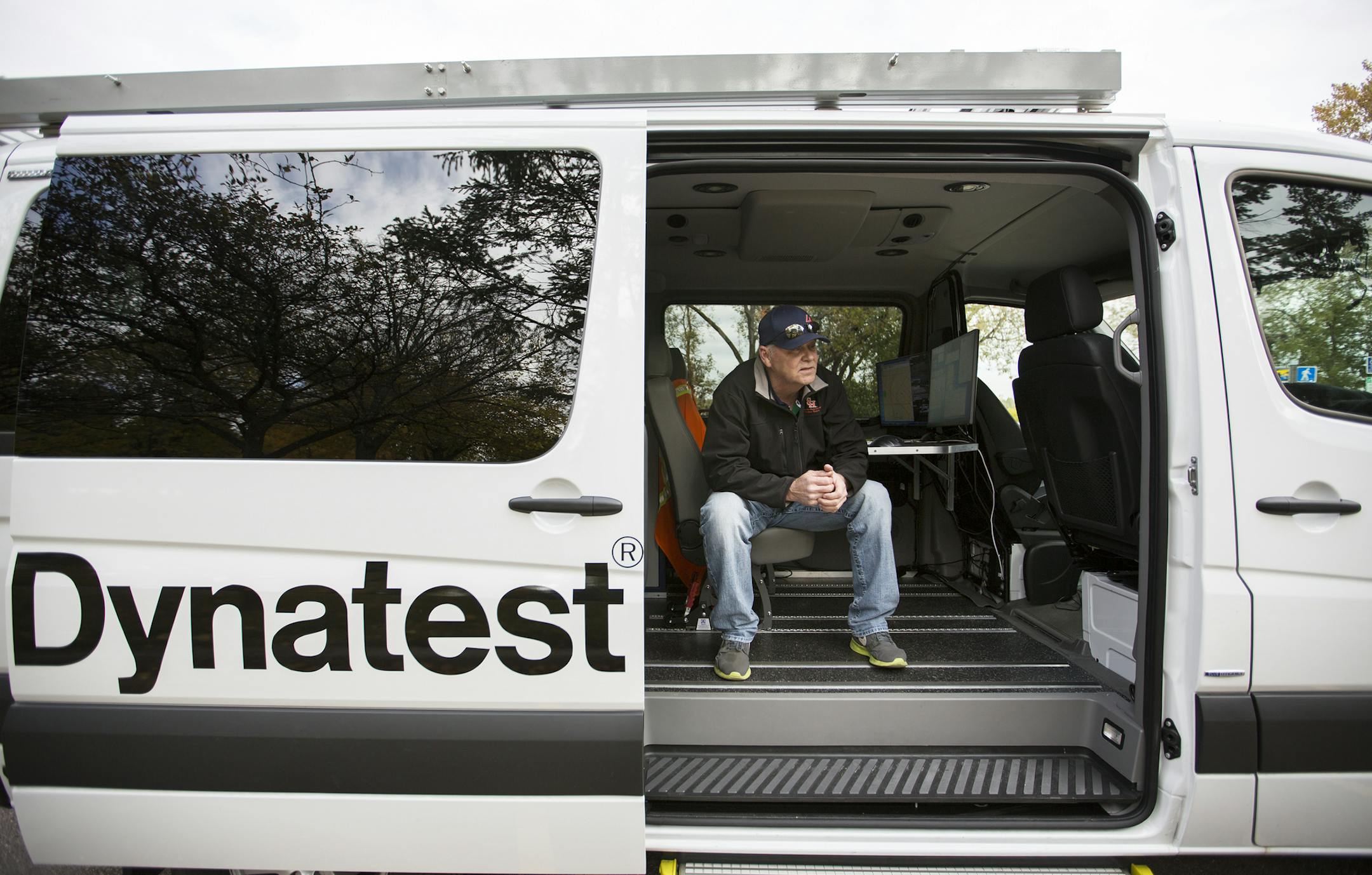 Toby Homuth of Dynatest, which is contracted with Minneapolis to operate the van, sat inside of the vehicle.