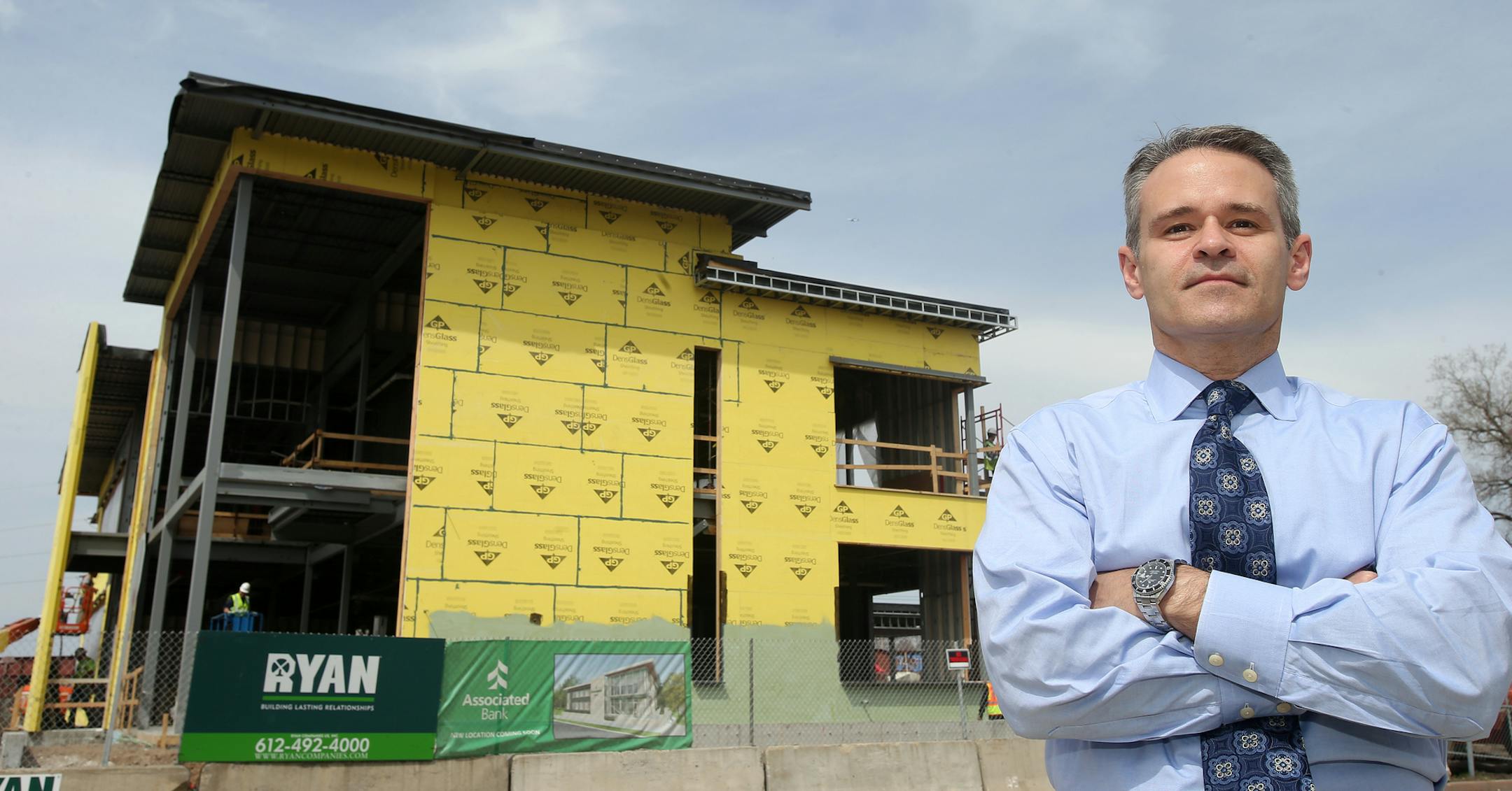 Senior Vice President, David A. Prince of Associated Bank near the construction site of their new bank. ] JOELKOYAMA‚Ä¢jkoyama@startribune St. Paul, MN on May 6, 2014.