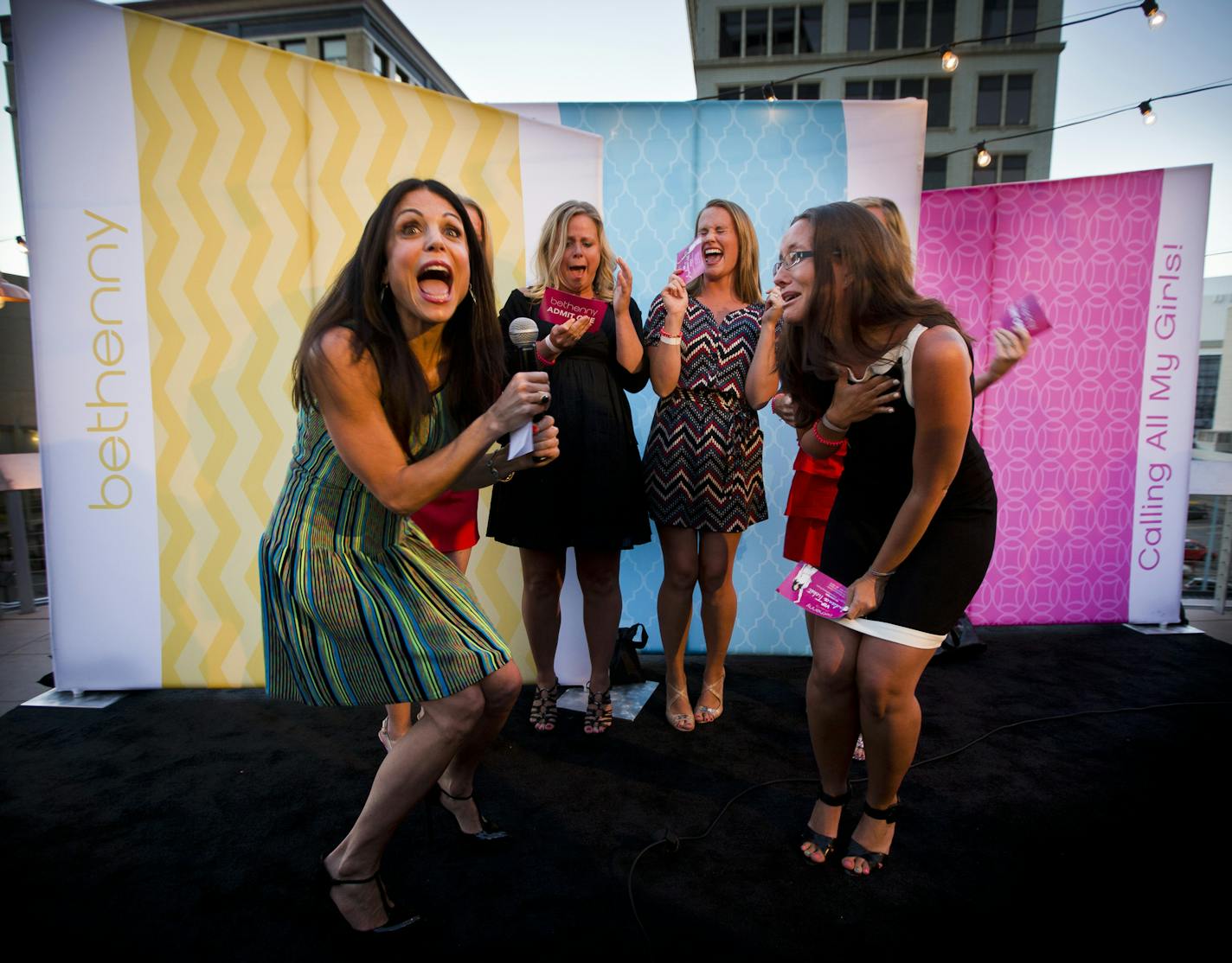 Bethenny Frankel, left, screamed with several fans after she had just surprised them with an all-expense paid trip to New York City to in the audience of the her new Fox show Bethenny premiering on September 9 during a private meet and greet at the Union Restaurant in downtown Minneapolis, Minn. on Wednesday, August 7, 2013. ] (RENEE JONES SCHNEIDER &#x2022; reneejones@startribune.com)