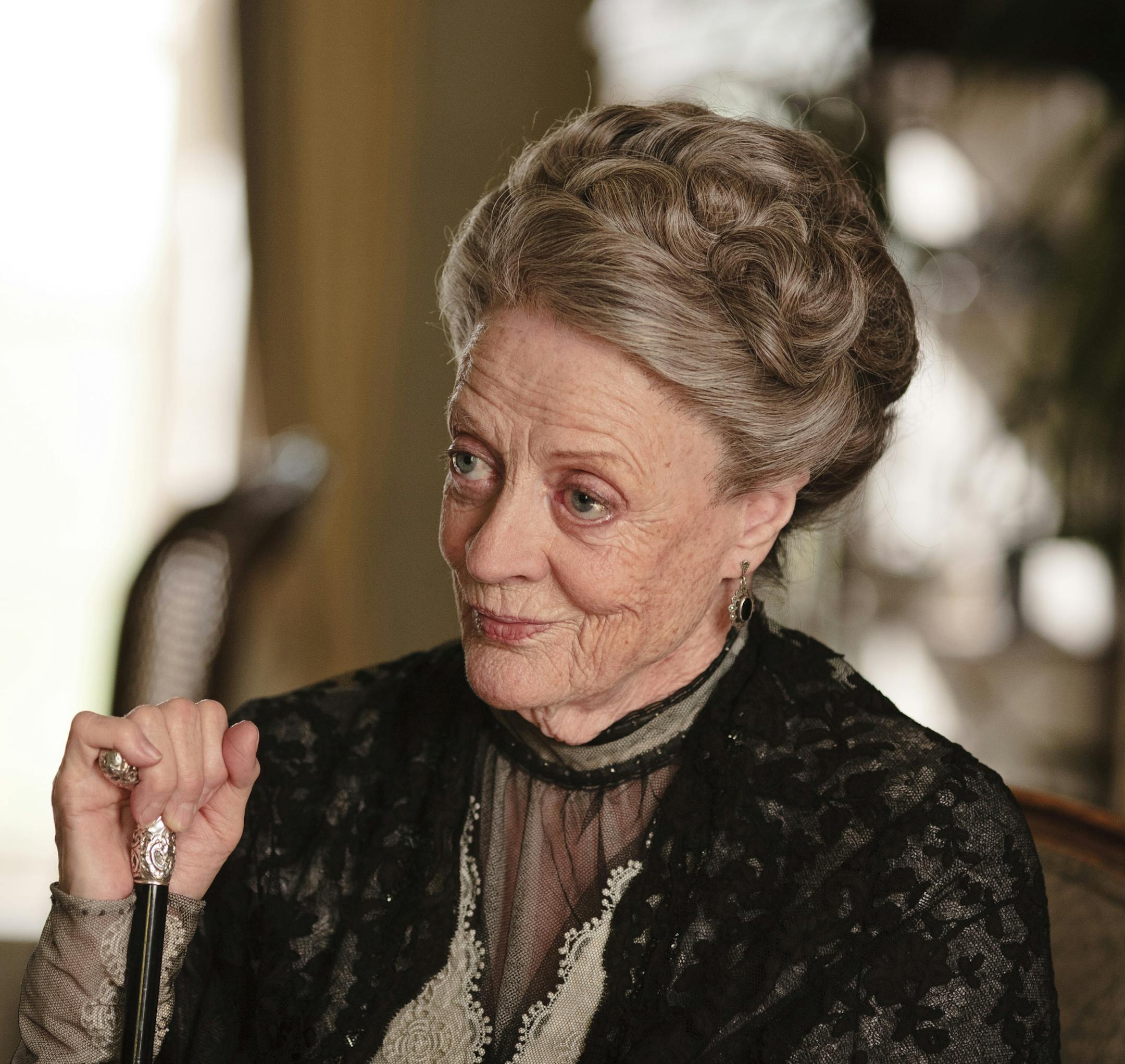 In this image released by PBS, Maggie Smith as the Dowager Countess is shown in a scene from the second season on "Downton Abbey." (AP Photo/PBS, Carnival Film & Television Limited 2011 for MASTERPIECE, Nick Briggs)