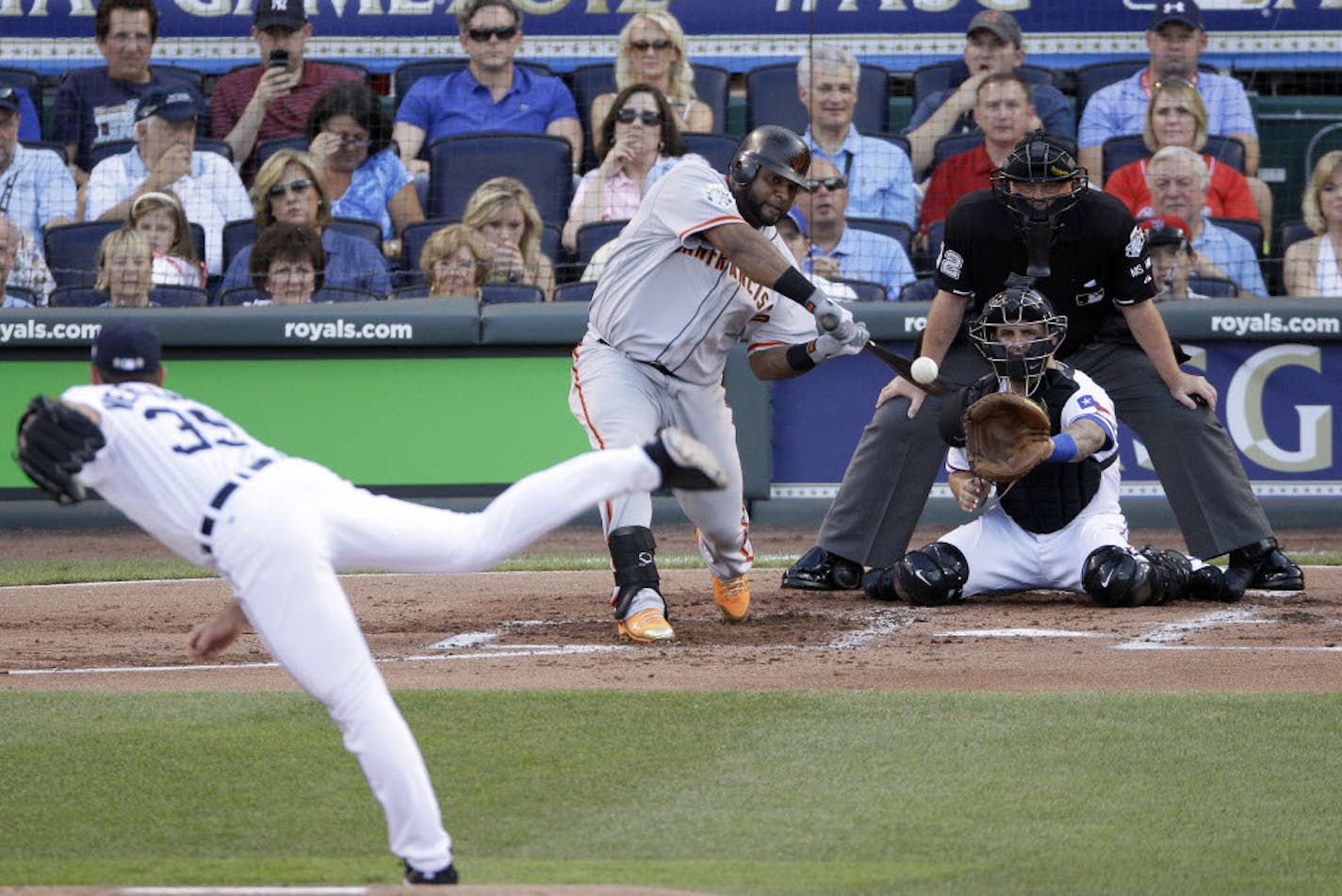 National League's Pablo Sandoval, of the San Francisco Giants, hits a three-run triple off American League's Justin Verlander, of the Detroit Tigers, in the first inning the MLB All-Star game Tuesday.