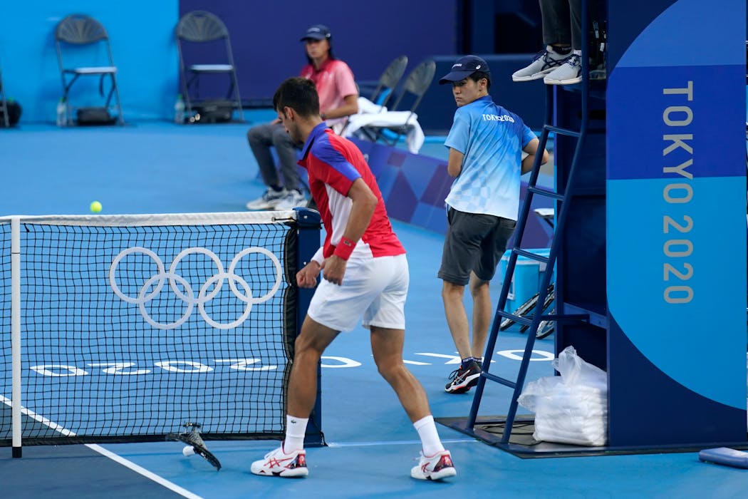 Novak Djokovic broke a racquet during his semifinal loss in tennis. 