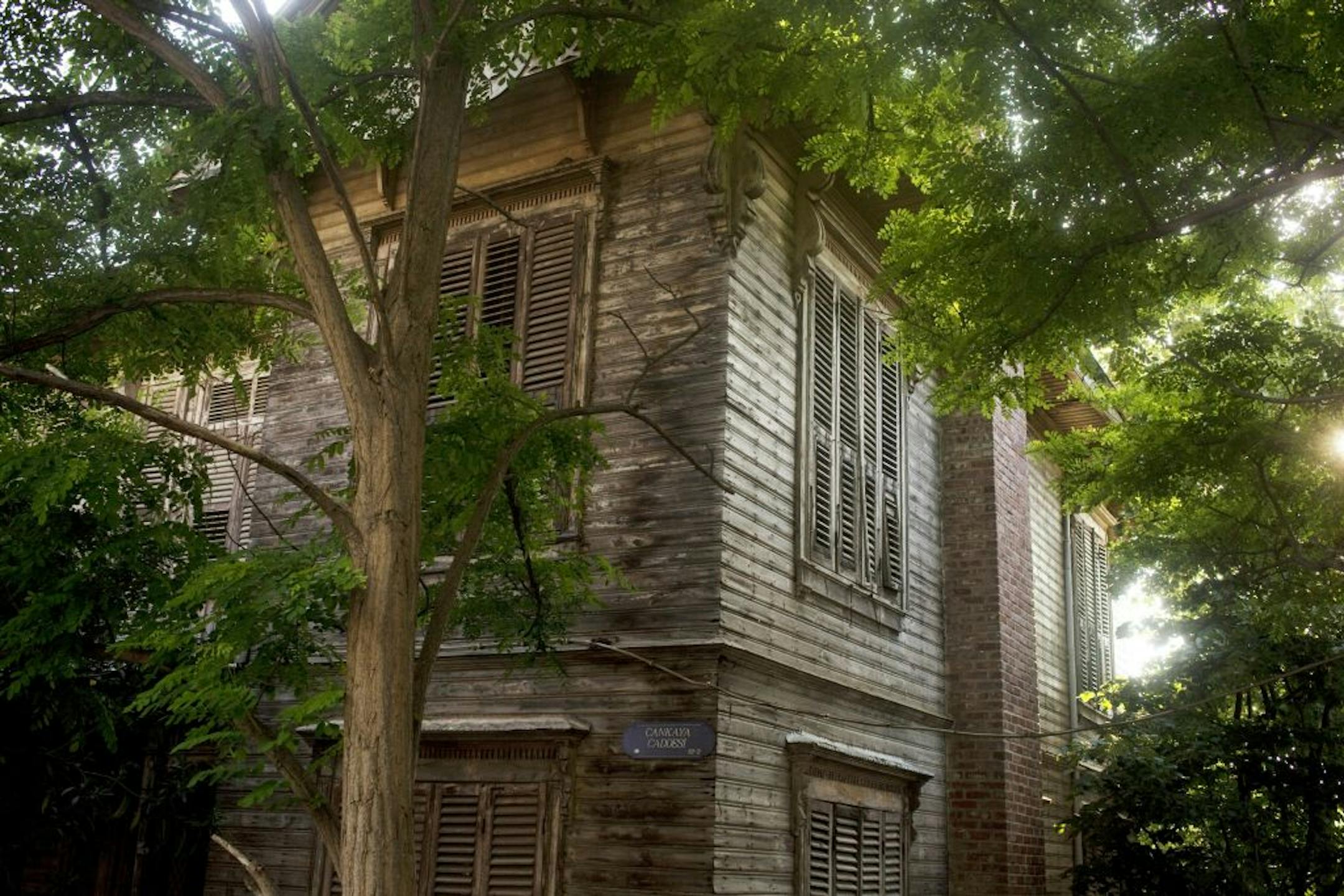 On the island of Buyukada in Turkey, a wooden summer house is left uncared for after the island went out of fashion.