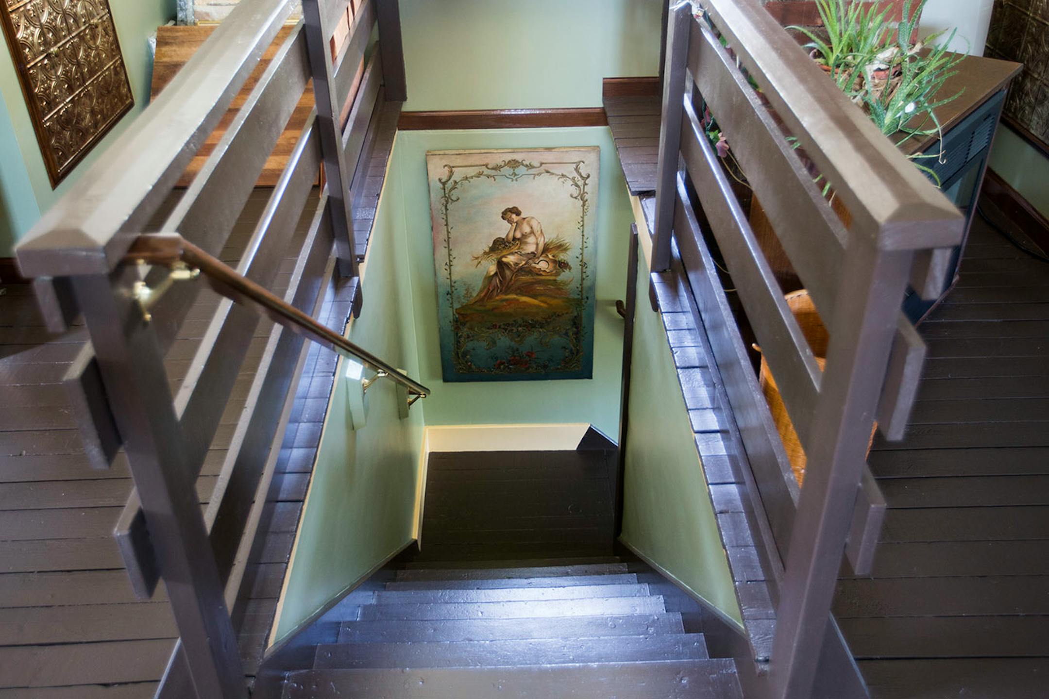 The staircase leading to the third floor attic of Carol Murto and Robert Nicpon.