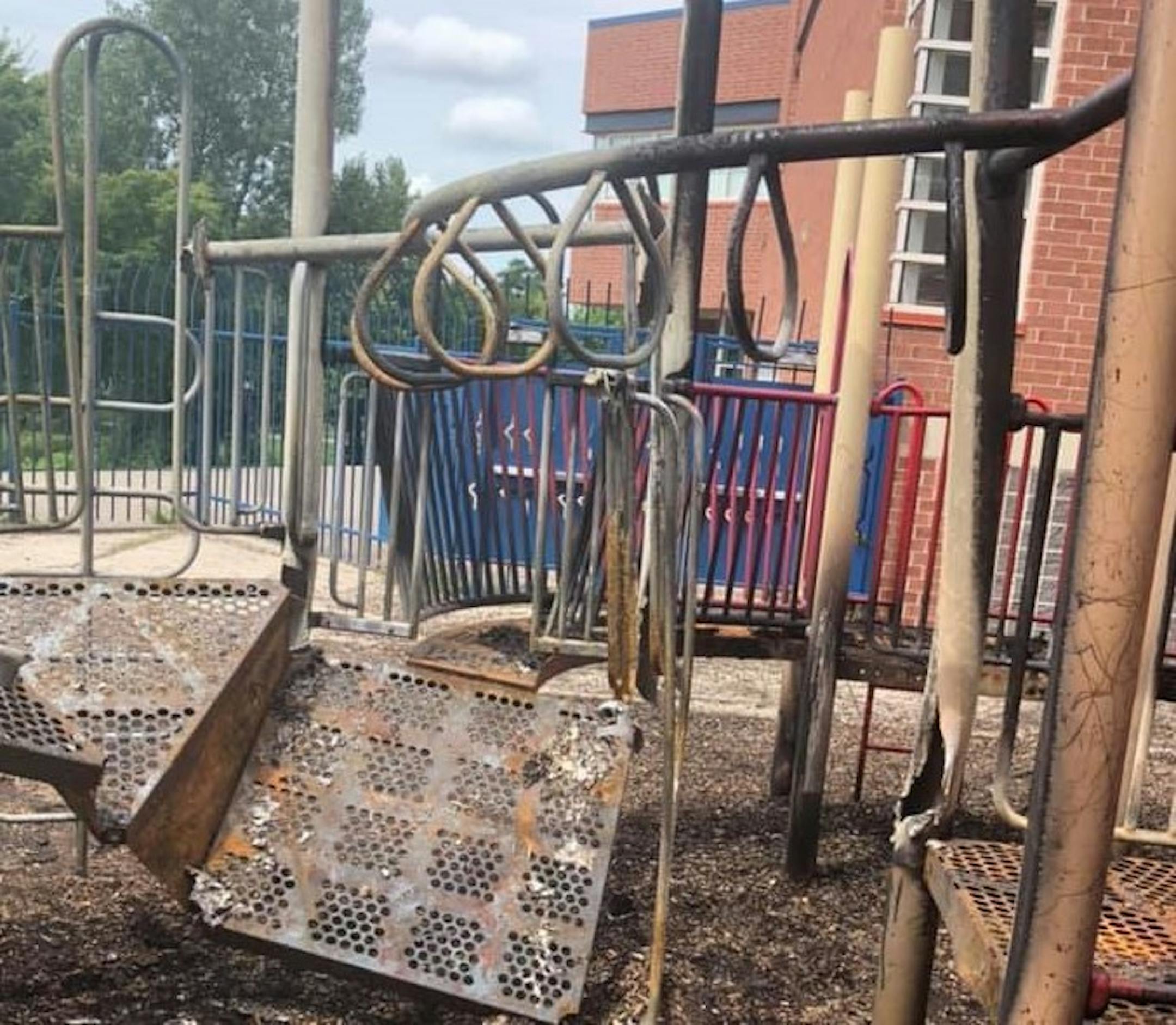 Hmong International Academy photo: Playground equipment was damaged by a suspicious overnight fire. ORG XMIT: 2B7ryjtYRFo2WlbXrR04