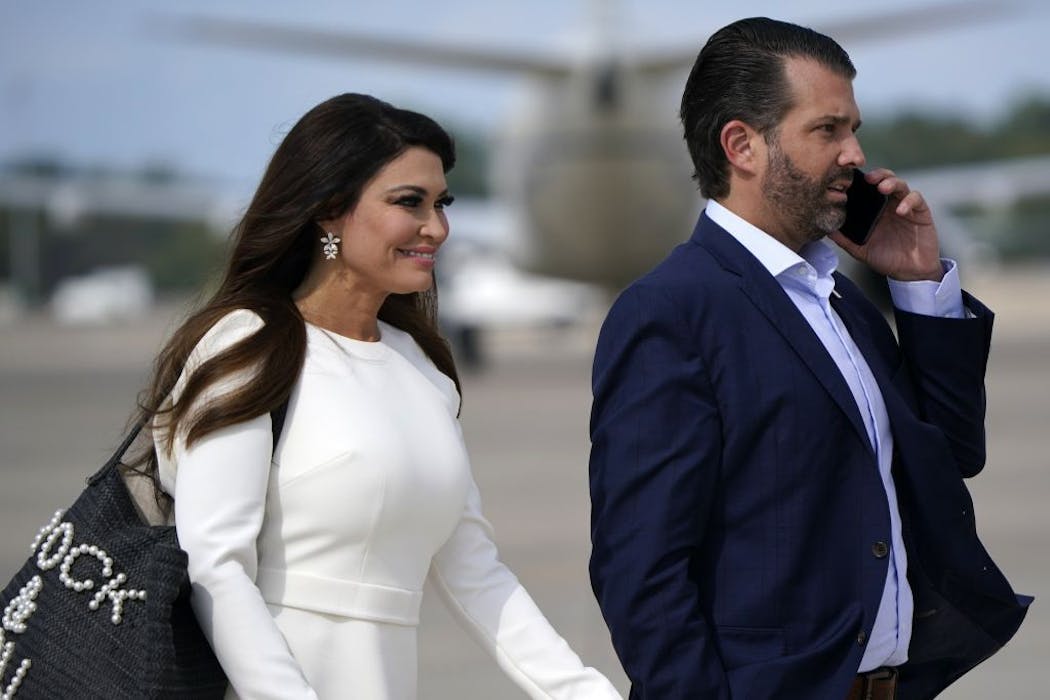 Kimberly Guilfoyle and Donald Trump Jr. walked across the tarmac to board Air Force One at Andrews Air Force Base before flying to Cleveland, Ohio, for the first presidential debate Tuesday, Sept. 29, 2020.