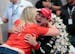 Will Power (shown hugging his wife, Liz, after winning the 2018 Indianapolis 500) won for the second time in three races by taking the checkered flag 