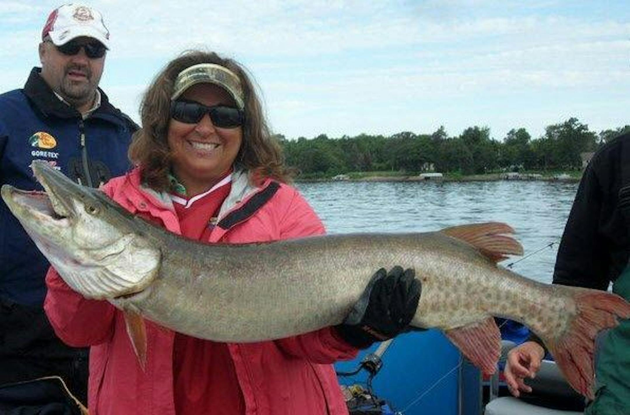FIRST MUSKIE: Sharla Kuehl of Shakopee hit paydirt on her first muskie fishing trip on Lake Mille Lacs this summer. After only two hours, she caught and released this 45-incher.