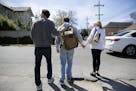 ADVANCE FOR USE SUNDAY, APRIL 24, 2016 AND THEREAFTER -In this Wednesday, March 2, 2016 photo, Sam Alexander and Ellen Schneider help their son, Ben, 