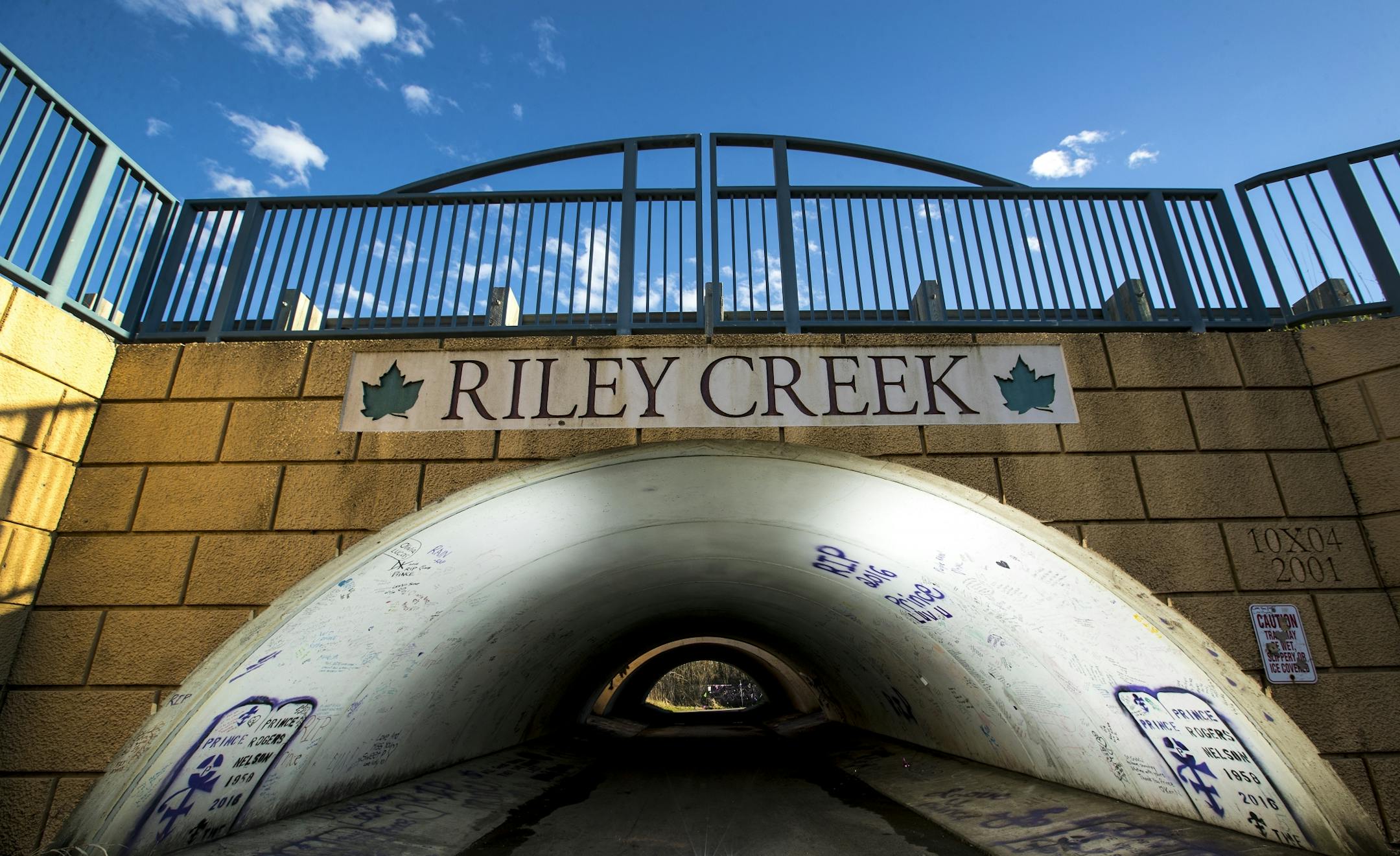 Prince fans have left messages and art on the underpass between Lake Ann Park and Paisley Park in Chanhassen.