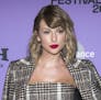 FILE - This Jan. 23, 2020 file photo shows Taylor Swift at the premiere of "Taylor Swift: Miss Americana" in Park City, Utah. Swift's eighth album "Fo