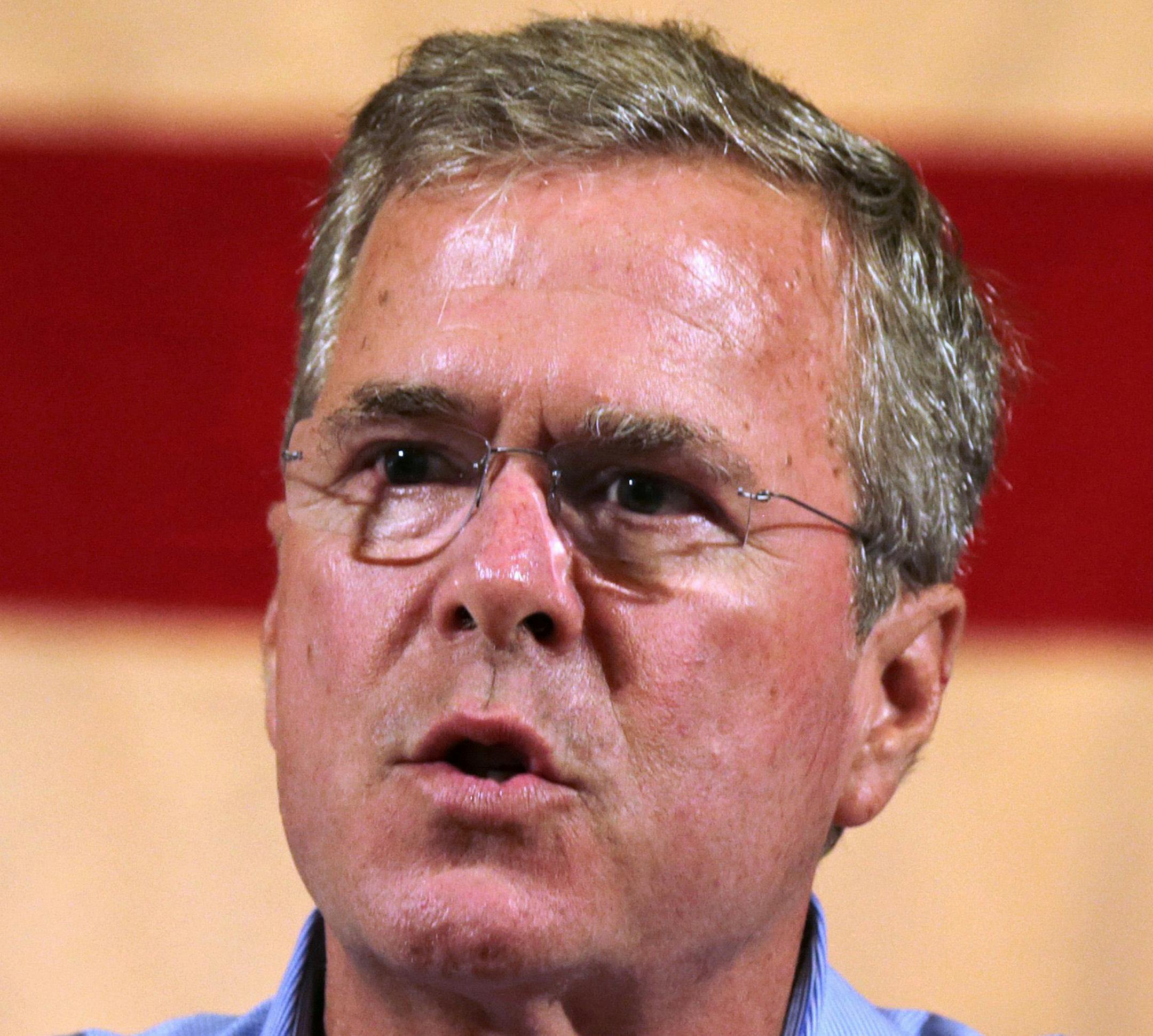 FILE - In this July 23, 2015 file photo, Republican presidential candidate former Florida Gov. Jeb Bush addresses guests during a town hall style gathering in Gorham, N.H. Bush and four other GOP presidential candidates are at a luxury Southern California resort speaking to the billionaire Koch brothers and other conservative donors. (AP Photo/Charles Krupa, File) ORG XMIT: MIN2015080419595473