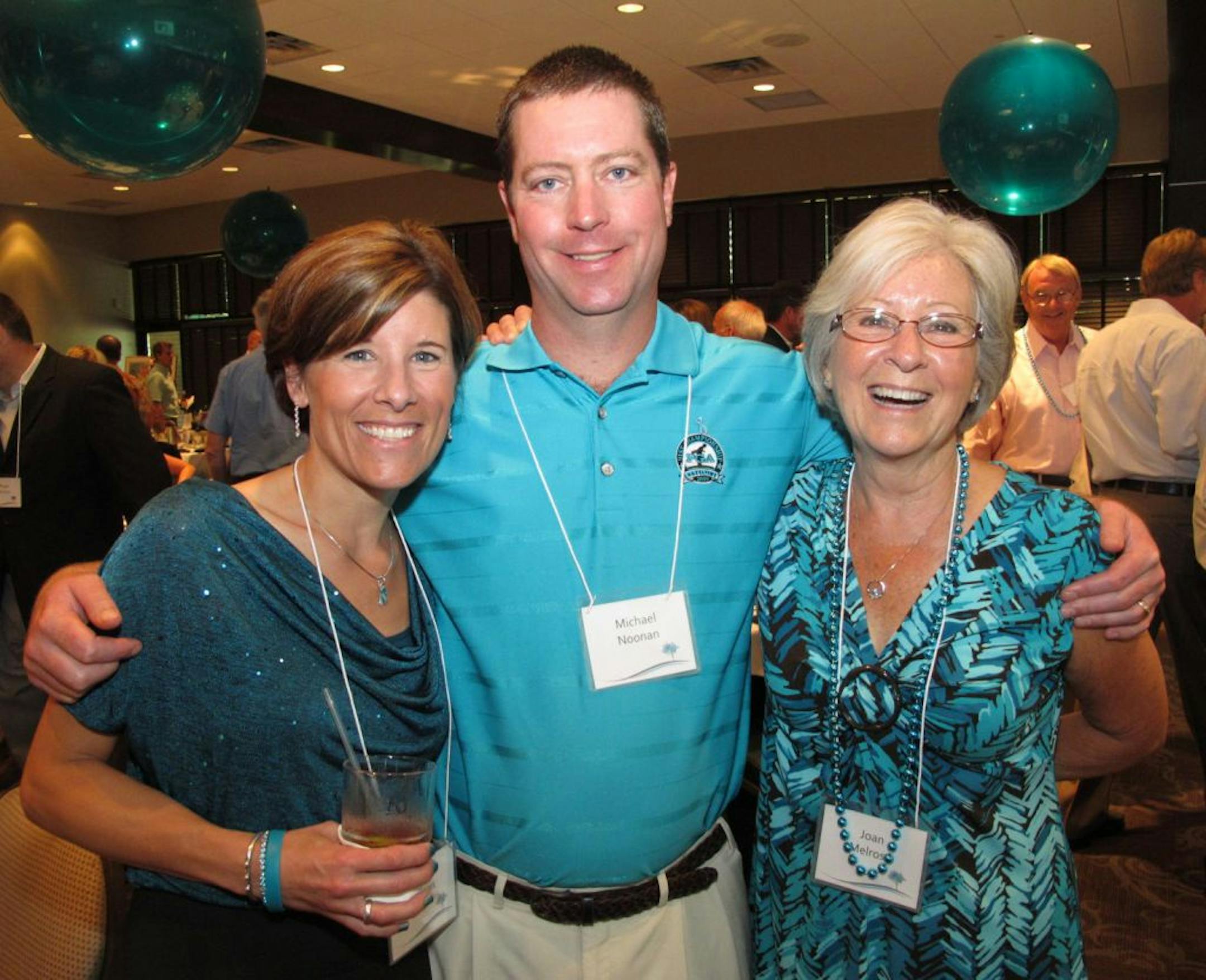 Minnesota Ovarian Cancer Alliance (MOCA) held its Mid Summer Night's Gala at Brackett's Crossing Country Club in Lakeville. Sarah and Mike Noonan and Joan Melrose.