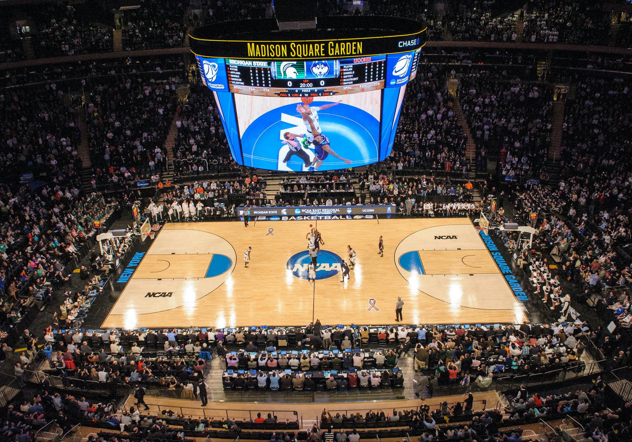 March 30, 2014 - New York City, NY, USA - Sunday March 30, 2014: It's game time. The tip-off of the NCAA tournament eastern regional final basketball game between Michigan State and UConn at Madison Square Garden in New York City, NY. UConn beat Michigan State 60-54 and advances to the final four. Bill Shettle / Cal Sport Media. (Cal Sport Media via AP Images) ORG XMIT: CSMAP