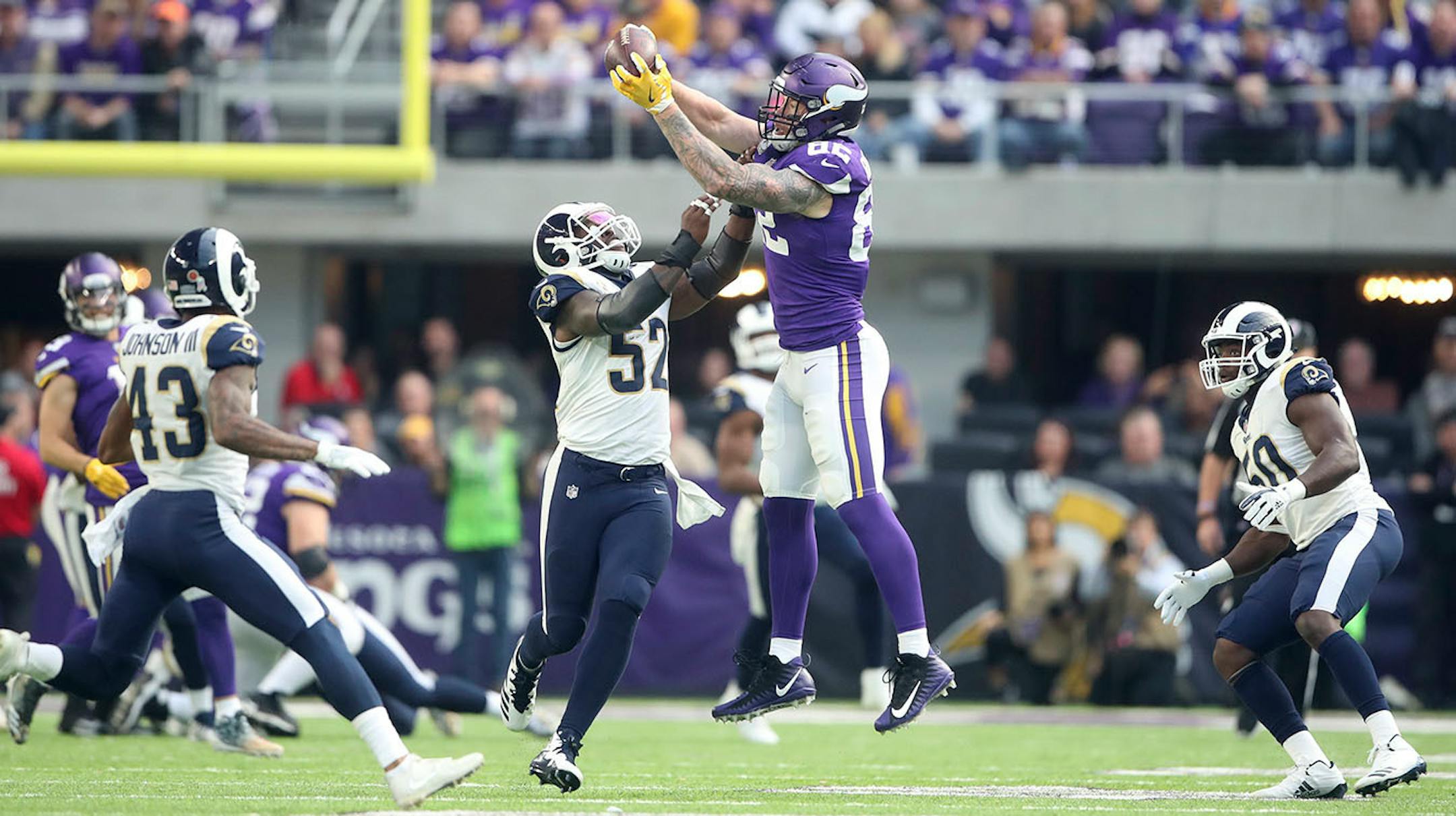 Minnesota Vikings tight end Kyle Rudolph (82) caught a first down catch over Los Angeles Rams inside linebacker Alec Ogletree (52) in the second quarter at U.S. Bank Stadium Sunday November 19, 2017 in Minneapolis, MN.