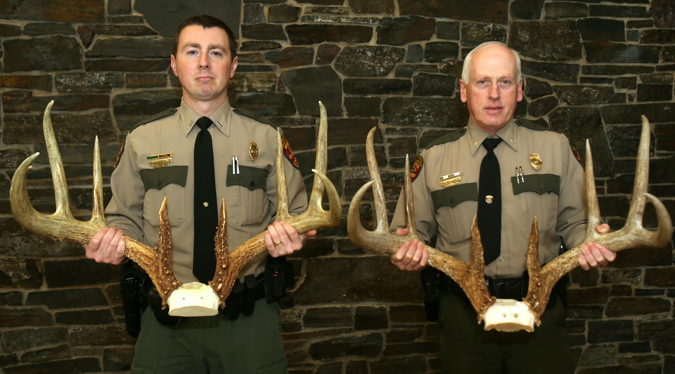 DNR officer Todd Kanieski (left) holds the replica and DNR enforcement chief Ken Soring (right) with the original world-class 8-point buck horns. St. Paul, MN, 2013. ] JOELKOYAMA&#x201a;&#xc4;&#xa2;joel koyama@startribune DNR is having seven replicas made of the world-class 8-point buck poached in southeastern Minnesota a few years back. Some of those antler reproductions will be mounted on deer heads and shown around the state for years to come on the DNR's "Wall of Shame.'' We're getting photo