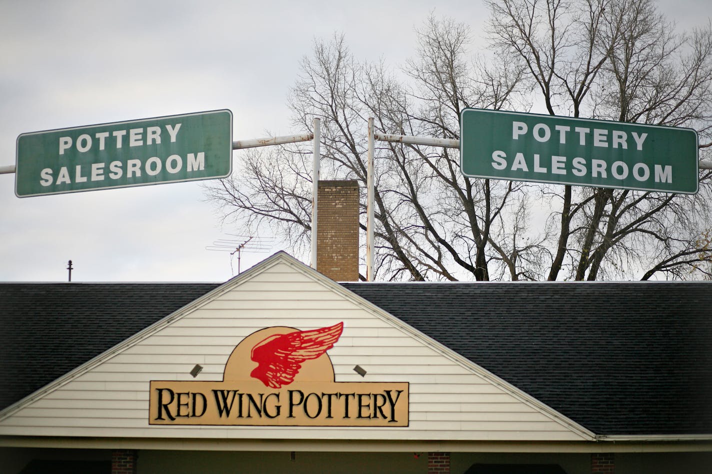 The iconic "SALESROOM" signs above Red Wing Pottery. Red Wing Pottery, a 140-year-old business whose name is inextricably woven with the Mississippi River town, will cease to exist at the end of the year unless a buyer comes foward. ] David Denney - Star Tribune ddenney@startribune.com 11/04/13 Red Wing, Mn ORG XMIT: MIN1311041724067558