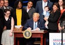 President Donald Trump signs an executive order to advance kidney health, at the Ronald Reagan Building and International Trade Center in Washington, 