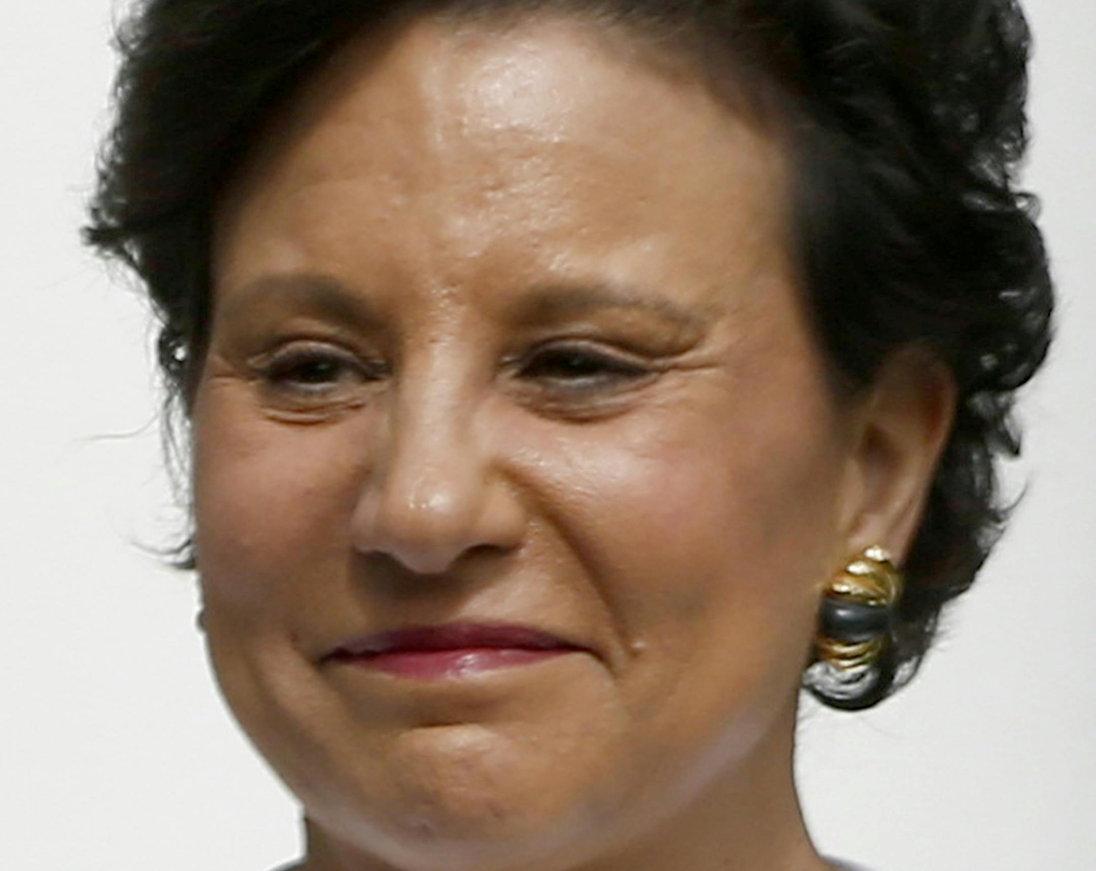 Penny Pritzker, President Barack Obama's nominee for Commerce Secretary, listens as Obama speaks in the Rose Garden of the White House in Washington, Thursday, May 2, 2013, where the president made the announcment. (AP Photo/Charles Dharapak)