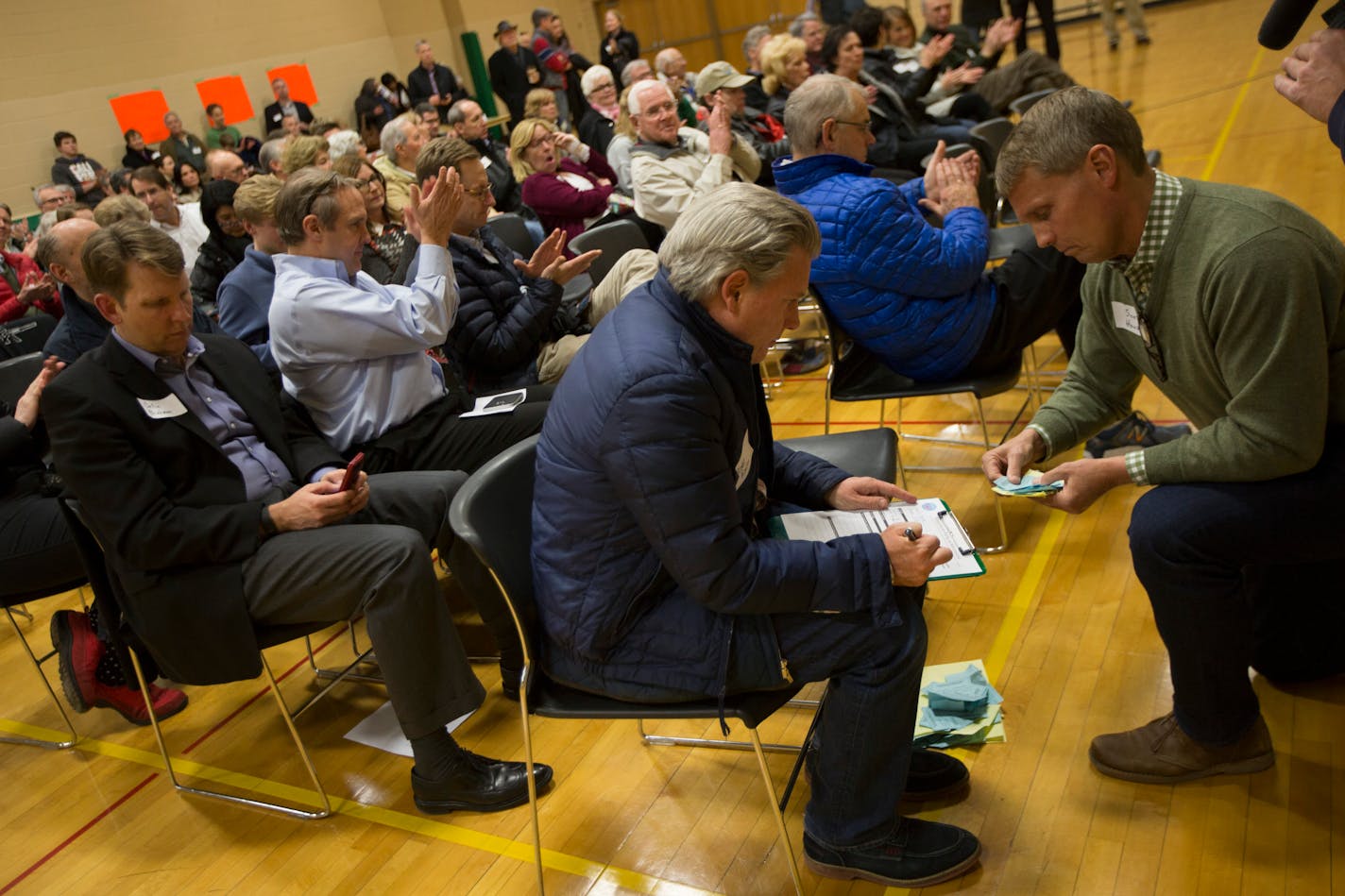 Tellers Blake Hanlon and Scot Housh count the Republican presidential ballots at South View Middle School, Tuesday, March 1, 2016, in Edina, Minn. Voters from Vermont to Colorado, Alaska to American Samoa and a host of states in between took to polling places and caucus sites Tuesday, on the busiest day of the 2016 primaries. (Renee Jones Schneider/Star Tribune via AP) MANDATORY CREDIT; ST. PAUL PIONEER PRESS OUT; MAGS OUT; TWIN CITIES LOCAL TELEVISION OUT