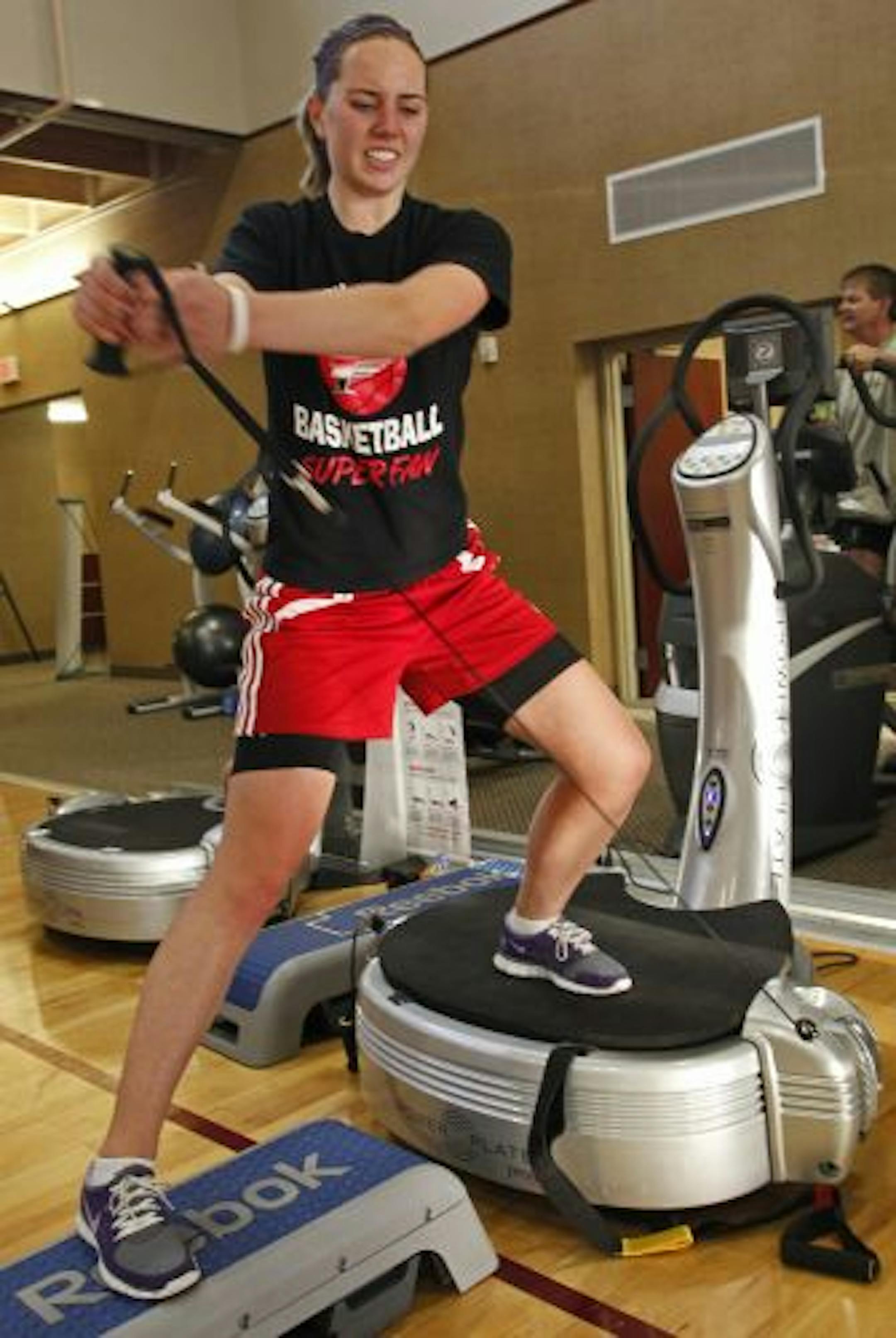 Kendall Wilkins, 16, worked out on the Power Plate.