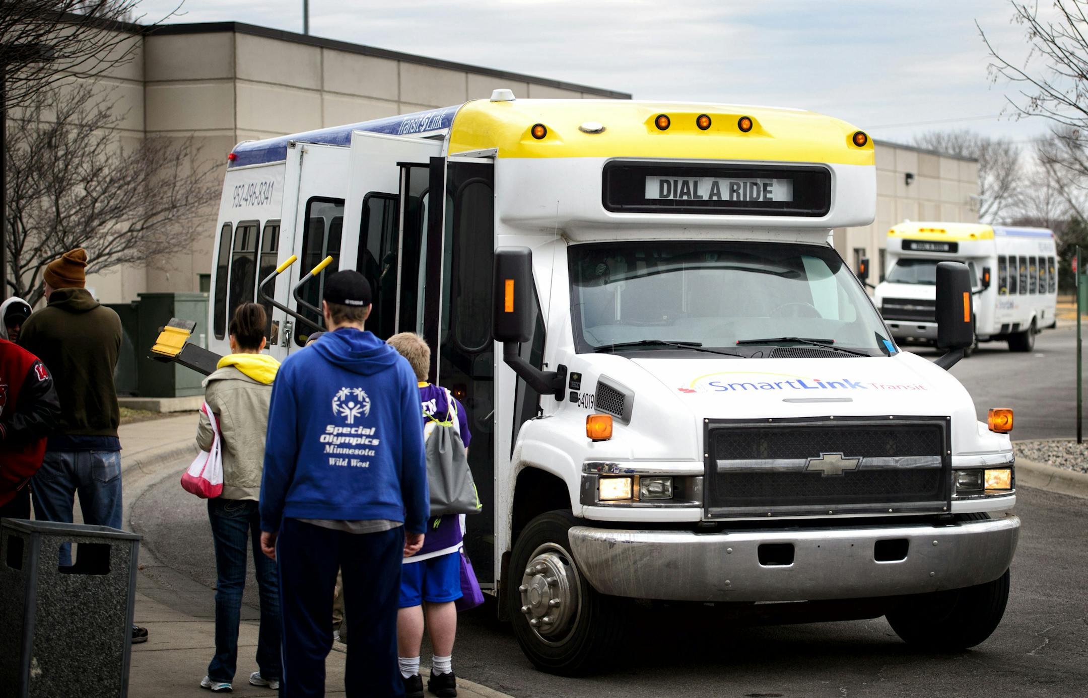 SmartLink busses pulled up to the Locations: SouthWest Metro Educational Cooperative in Shakopee, Minnesota. ] GLEN STUBBE * gstubbe@startribune.com Thursday, March 19, 2015 SmartLink drivers are facing massive layoffs this year -- every single driver, plus some additional staff -- as the result of a funding cut to the county program. Drivers are worried about what'll happen to their passengers, many of whom have mental and/or physical disabilities and have come to know and rely on their drivers
