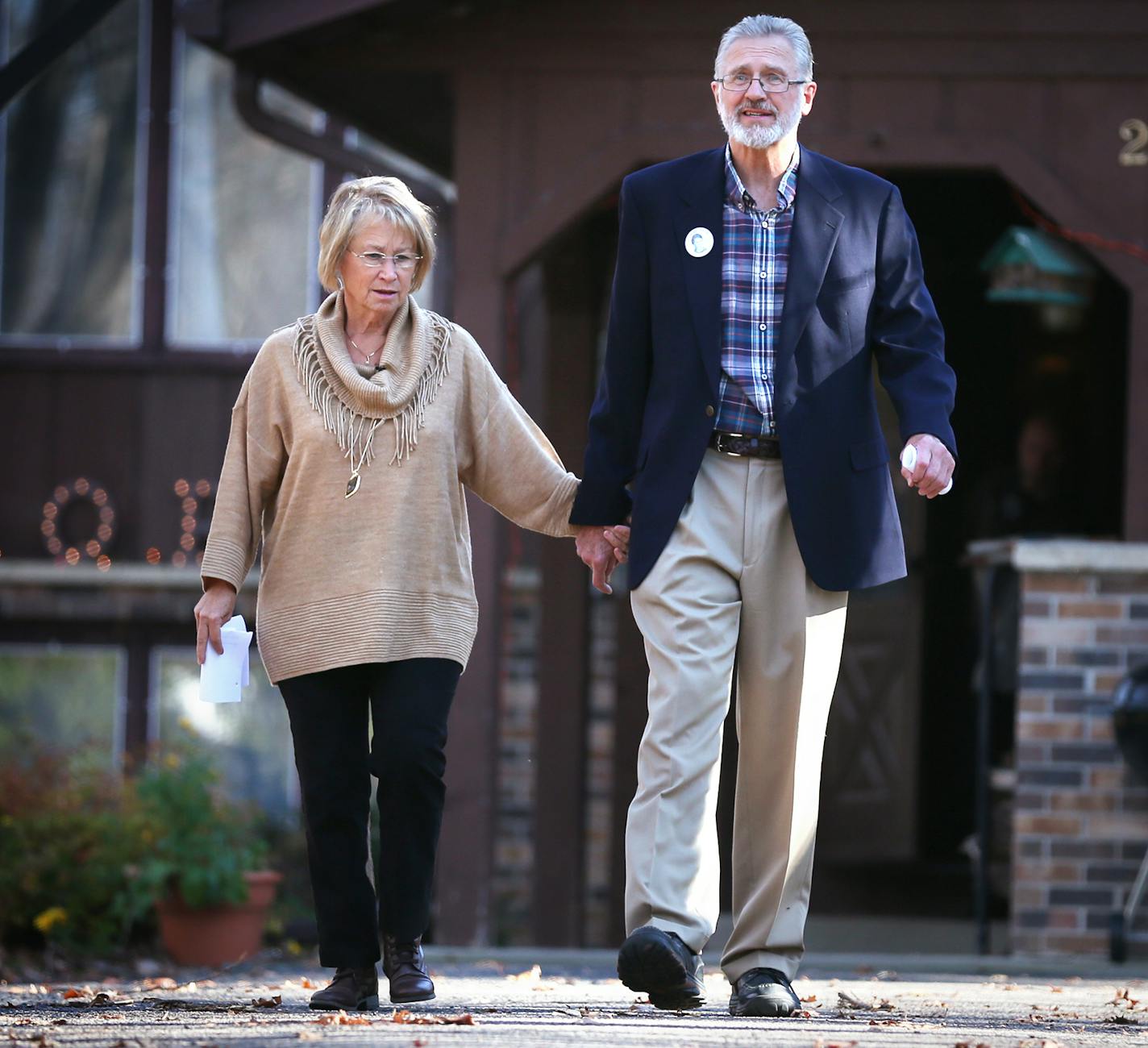 Patty and Jerry Wetterling walk out of their home to speak to the media in St. Joseph on Tuesday, November 3, 2015. ] (LEILA NAVIDI/STAR TRIBUNE) leila.navidi@startribune.com